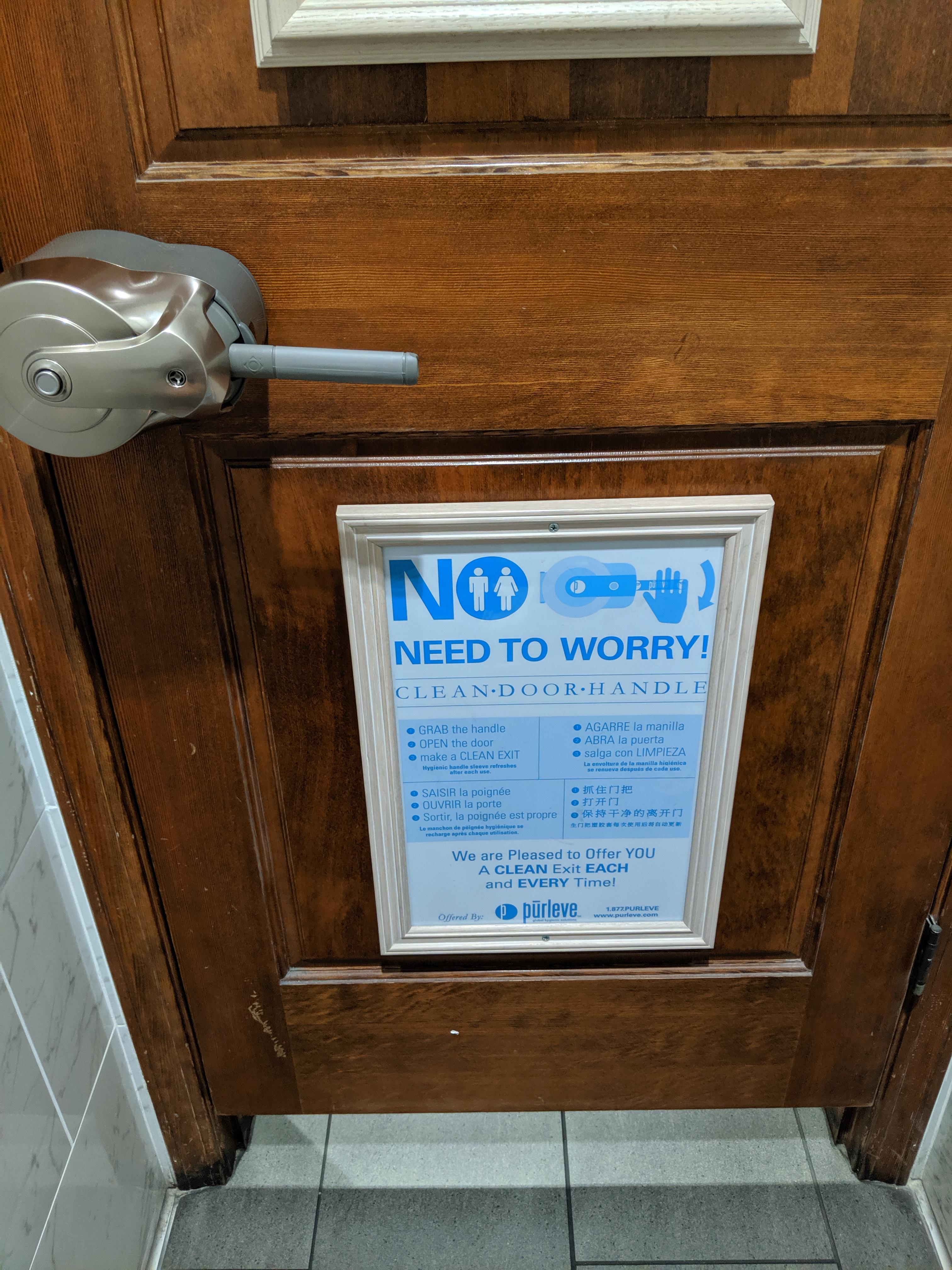 This reststop has self sanitizing door handles in the restroom r