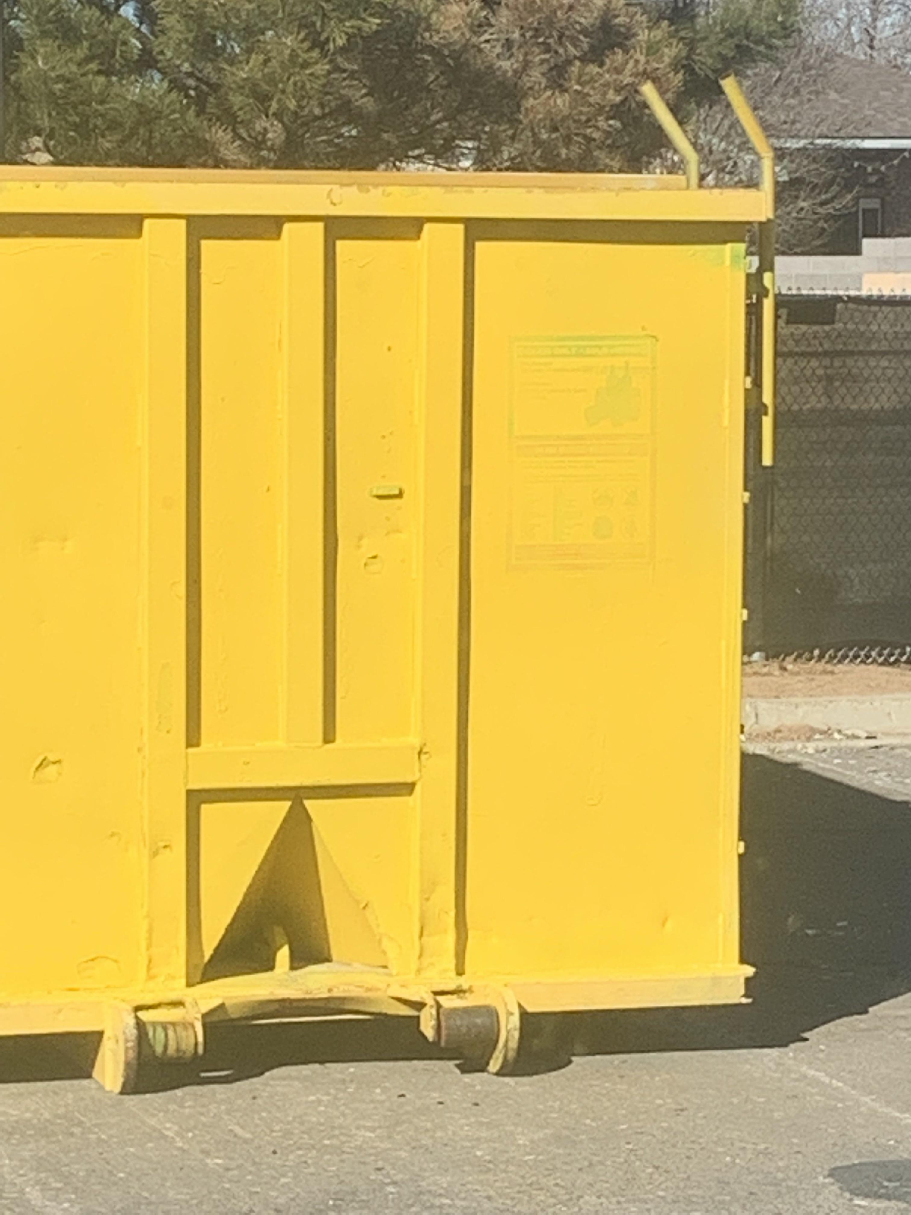 The guy who put yellow paint over the warning signs on this glass bin