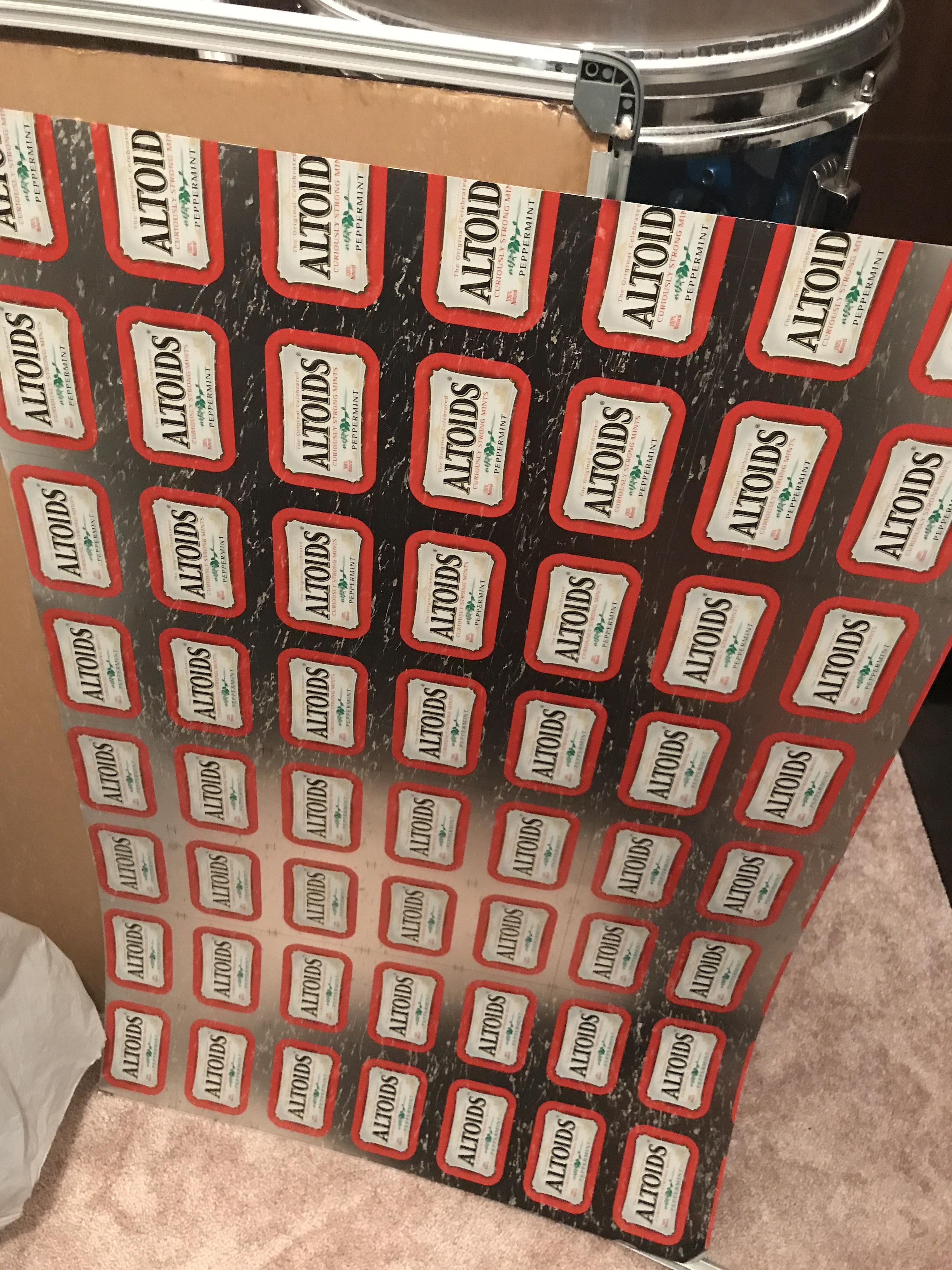 The backing of my dry erase board is made from a sheet of Altoid tins. r