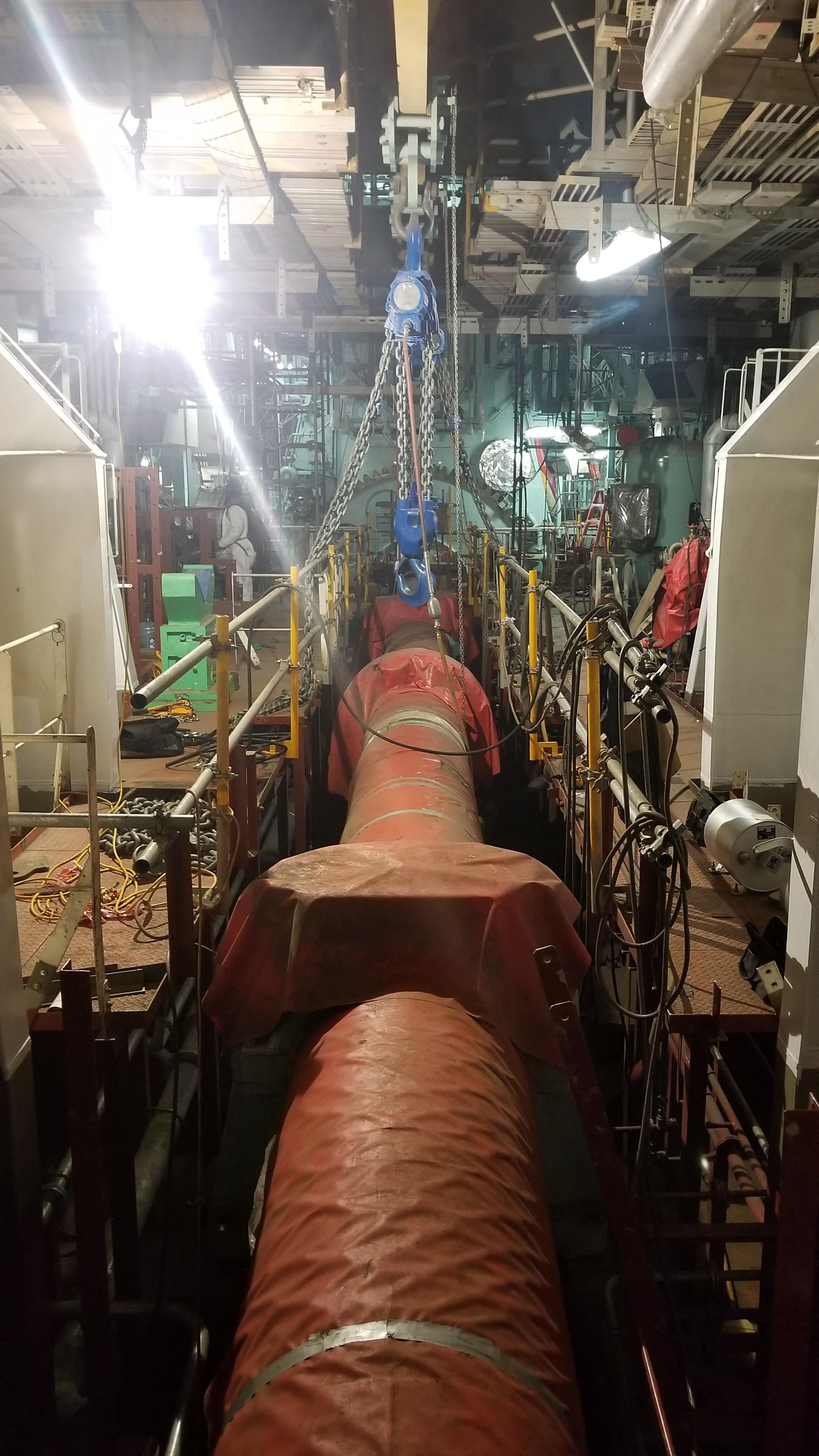 Looking forward from shaft alley at the main engine. Brand new ship