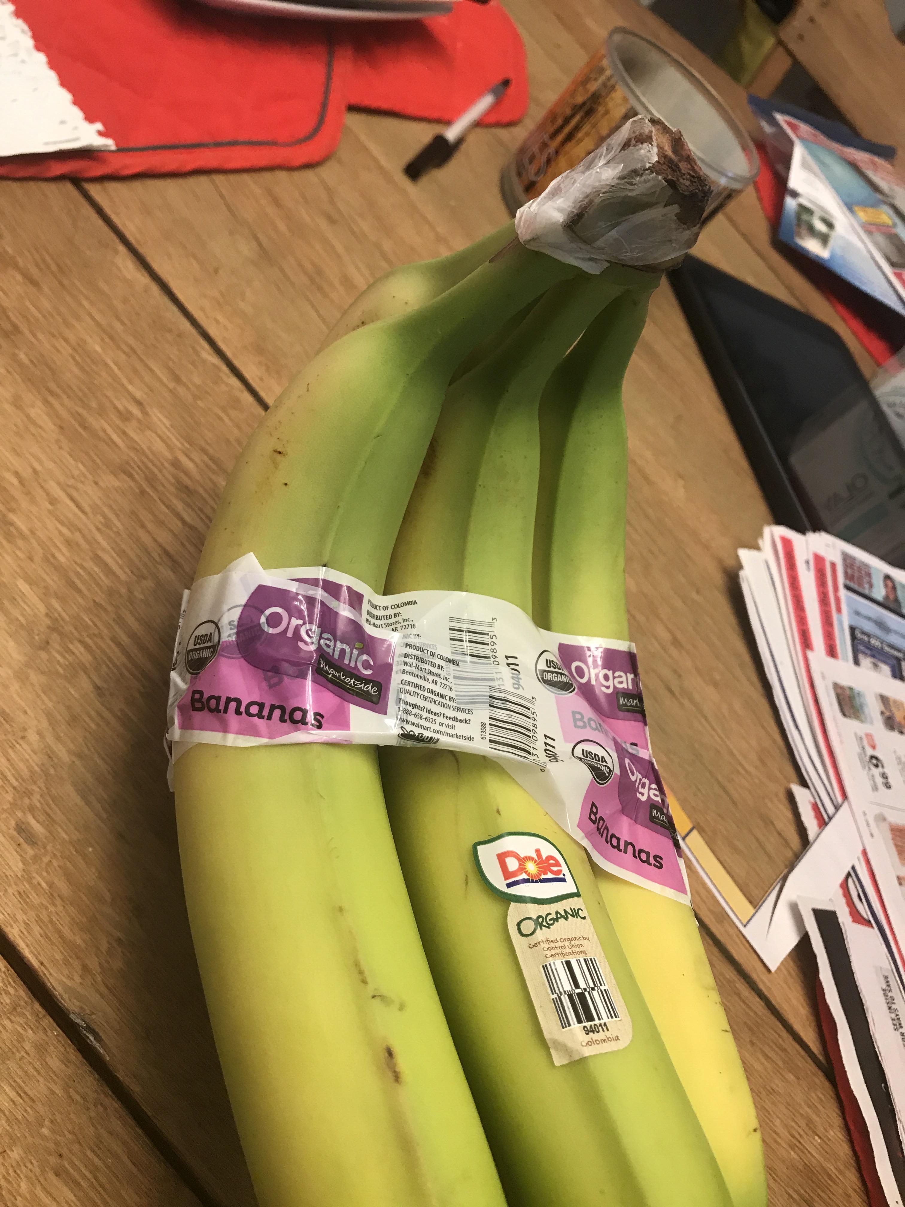 Why are organic bananas wrapped at the top & others not?