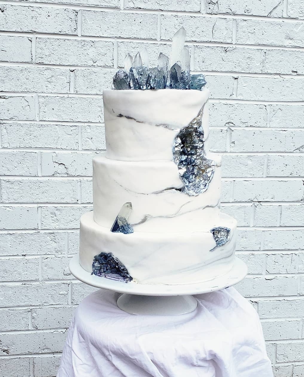 Tried my hand at making the trendy geode wedding cake, complete with