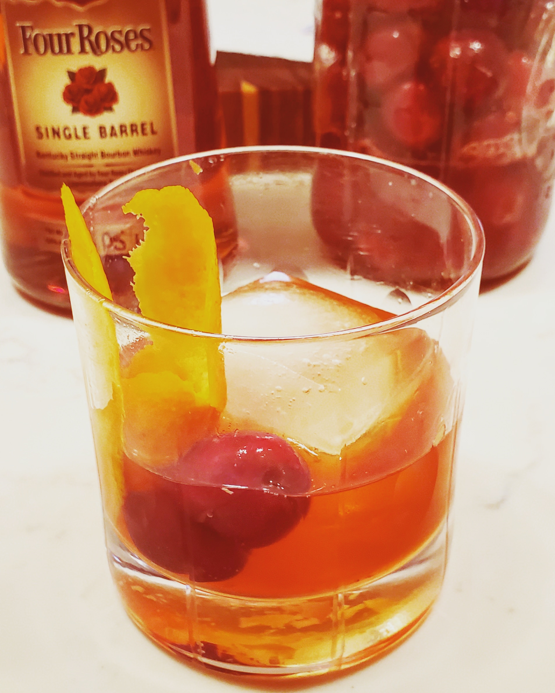 Old Fashioned made with fermented ginger honey and ginger bugfermented cherries. They're