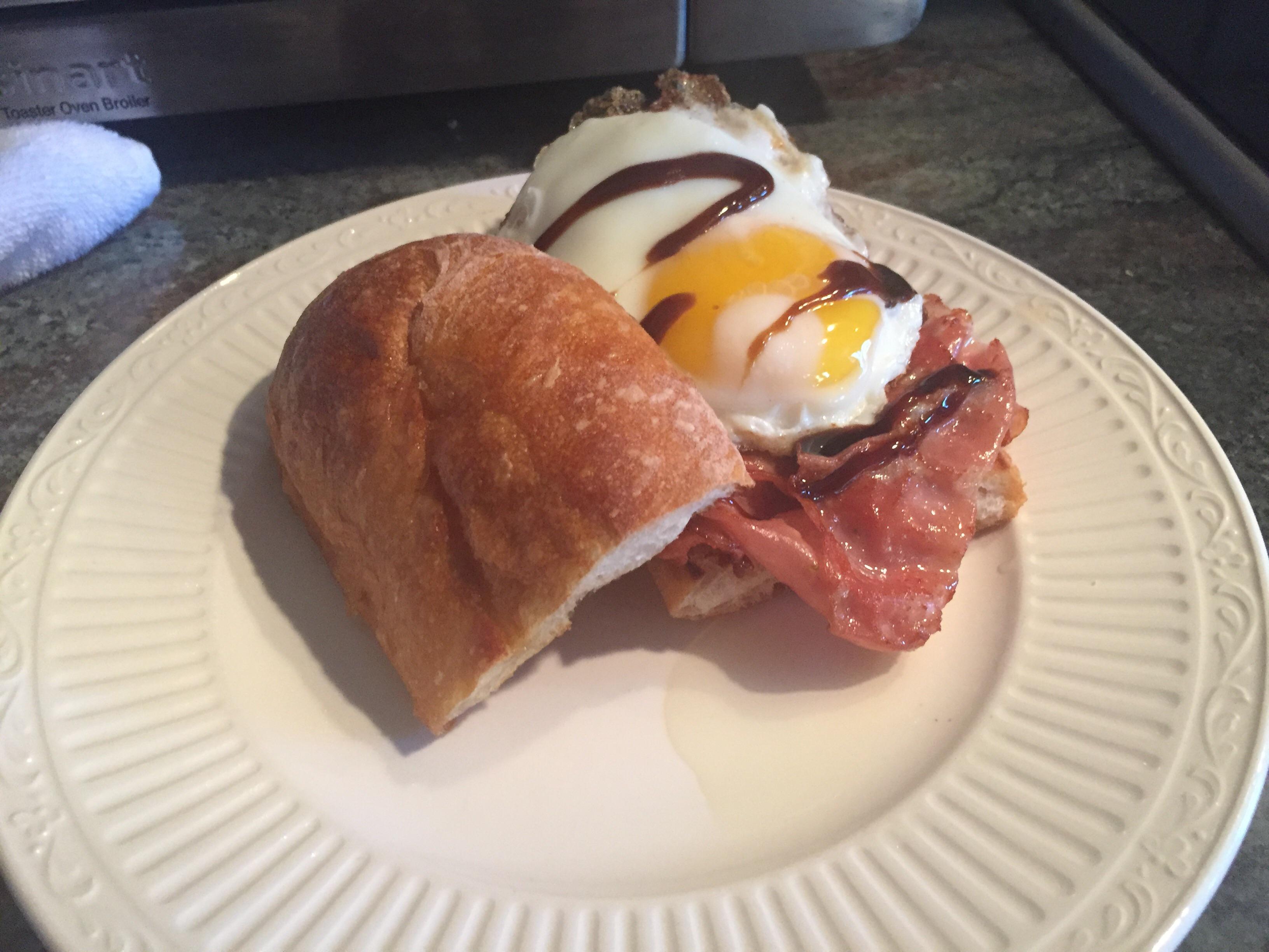 Fried mortadella and a fried egg with balsamic glaze r/PutAnEggOnIt