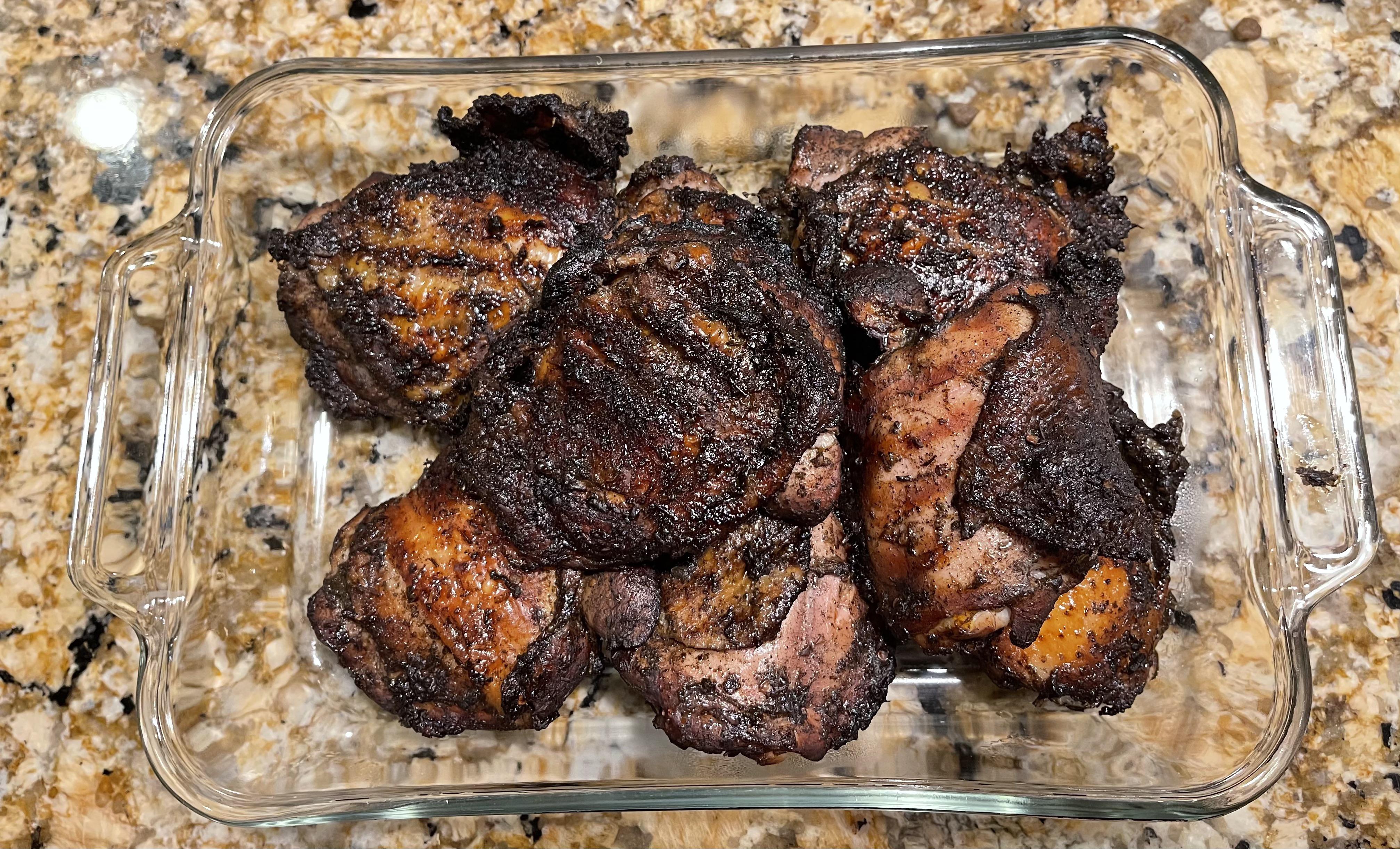 Jerk chicken thighs Walkerswood seasoning and pecan wood r/smoking