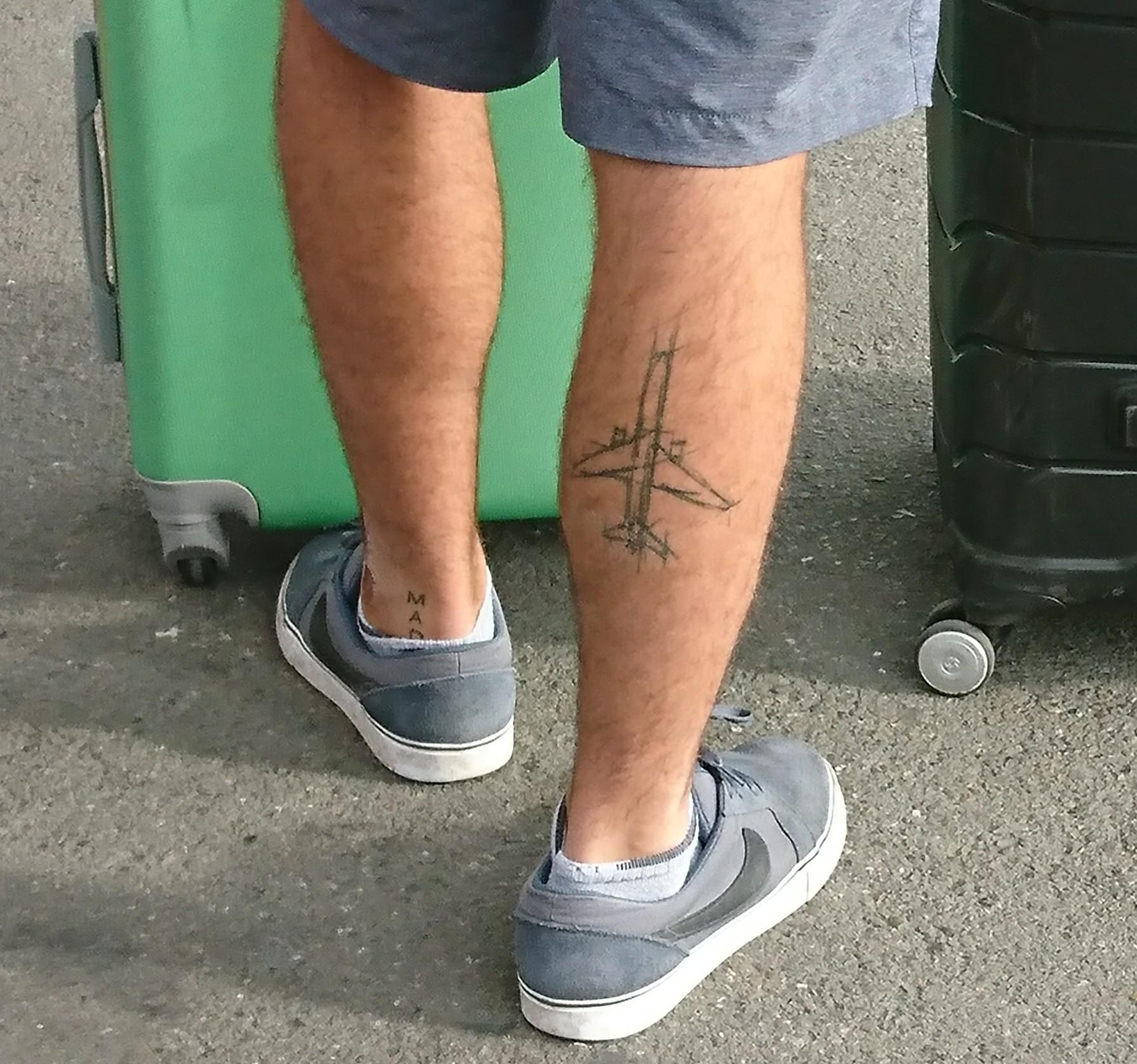 This tattoo seen at the airport r/mildlyinteresting