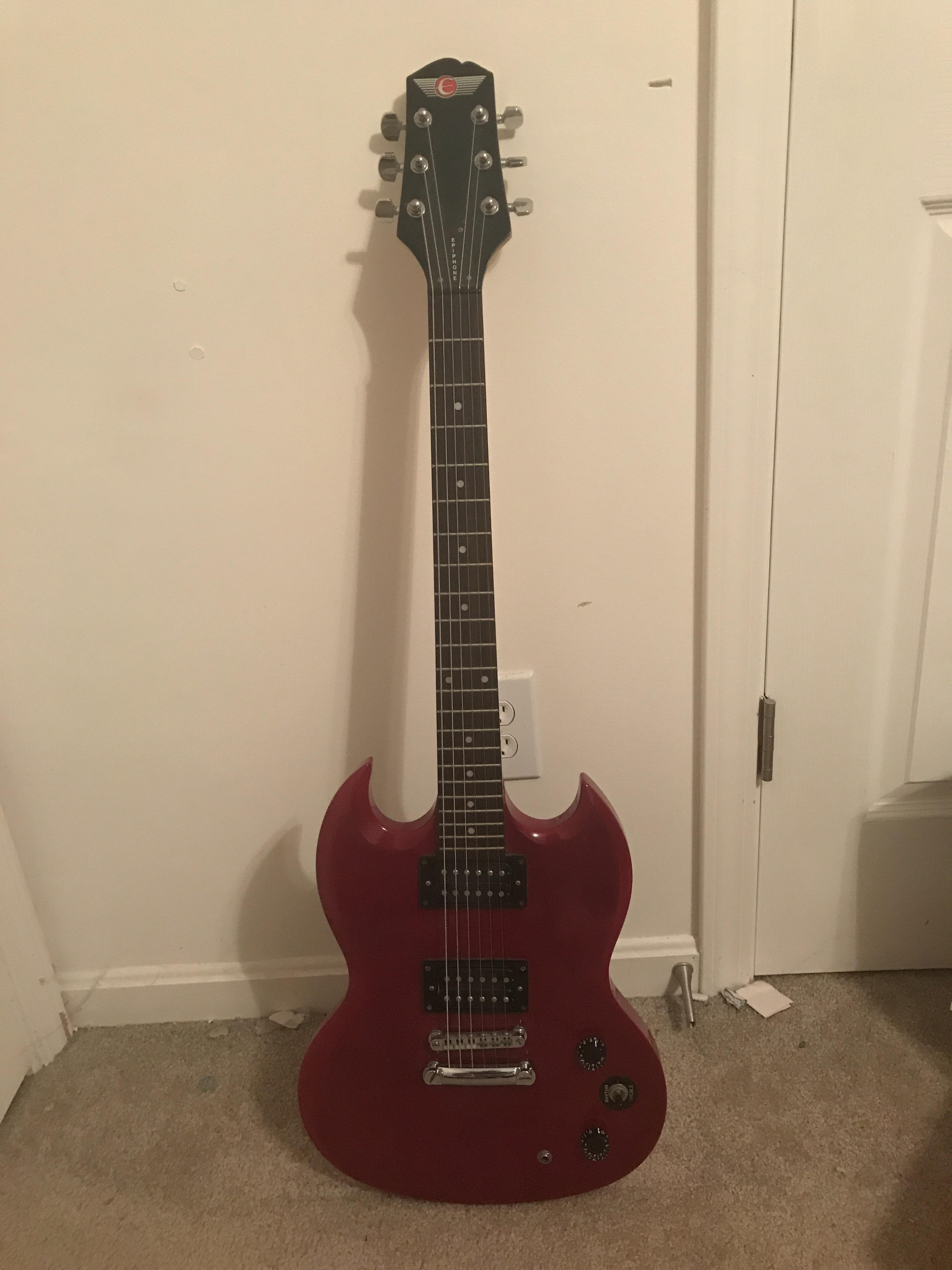 Anybody know what kind of guitar this is and or how much it’s worth