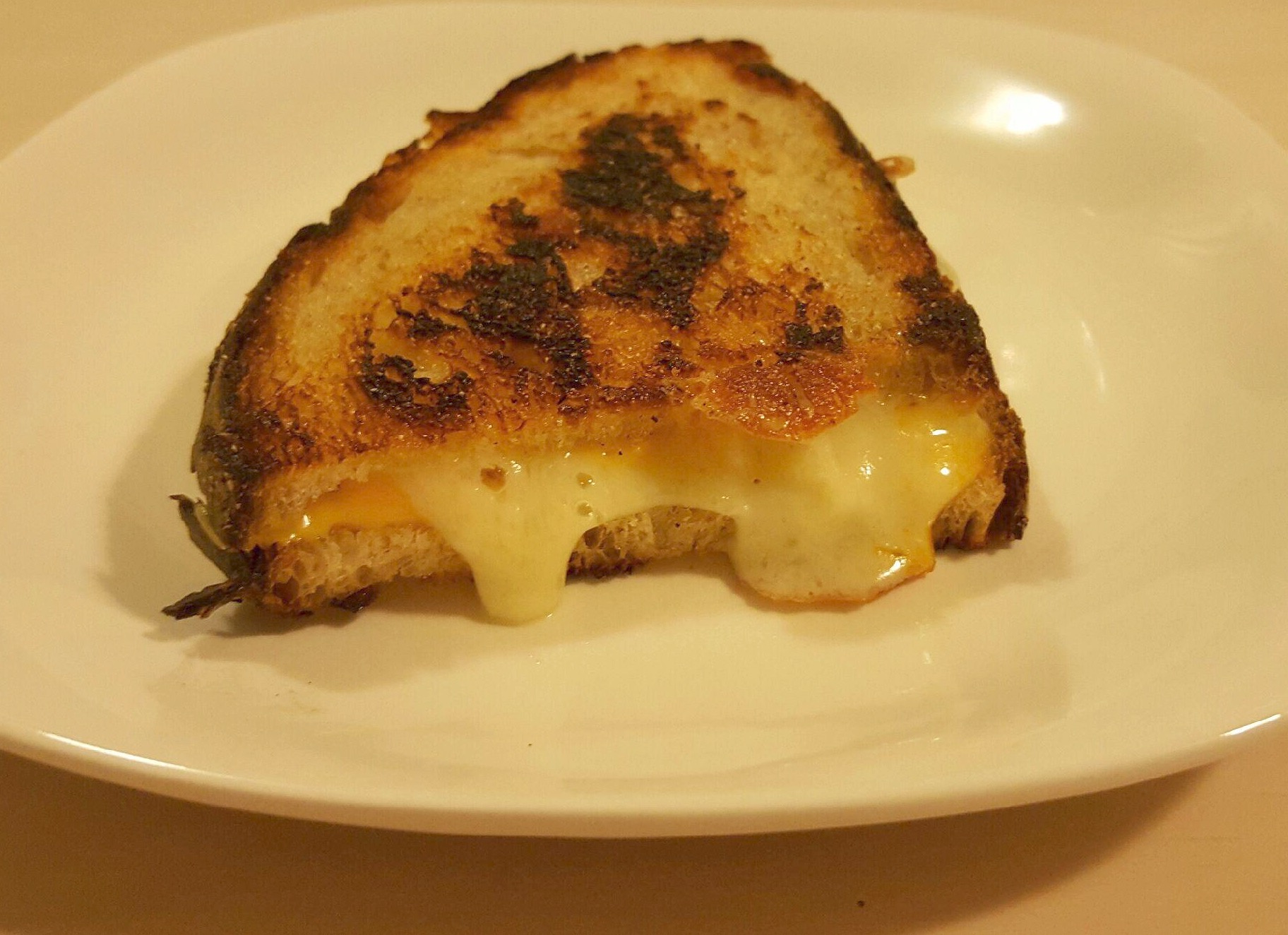 [OC] Sourdough grilled cheese. Muenster & cheddar cheese on homemade