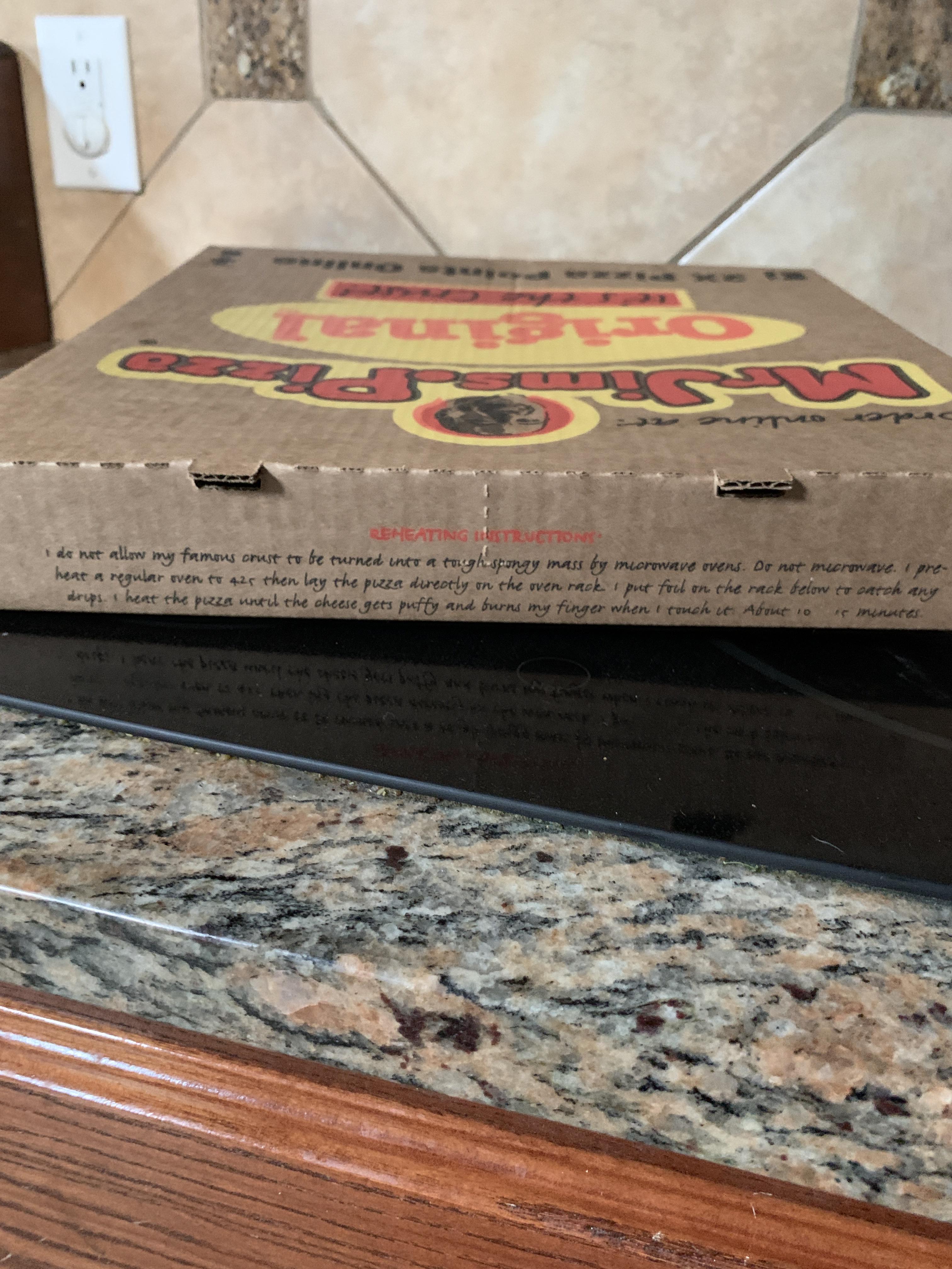 This pizza box heating instructions telling you to not microwave it r