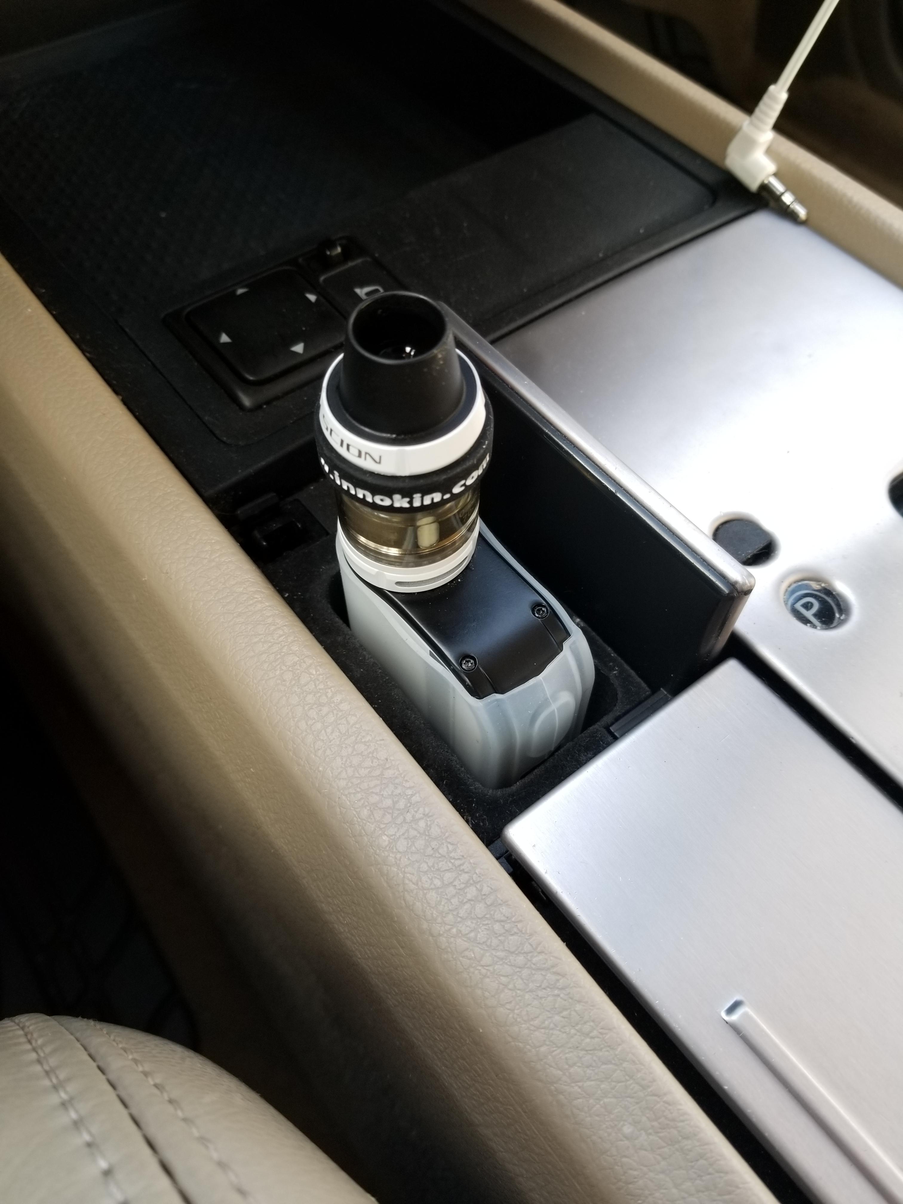 My car has a perfect slot for my vape r/Vaping