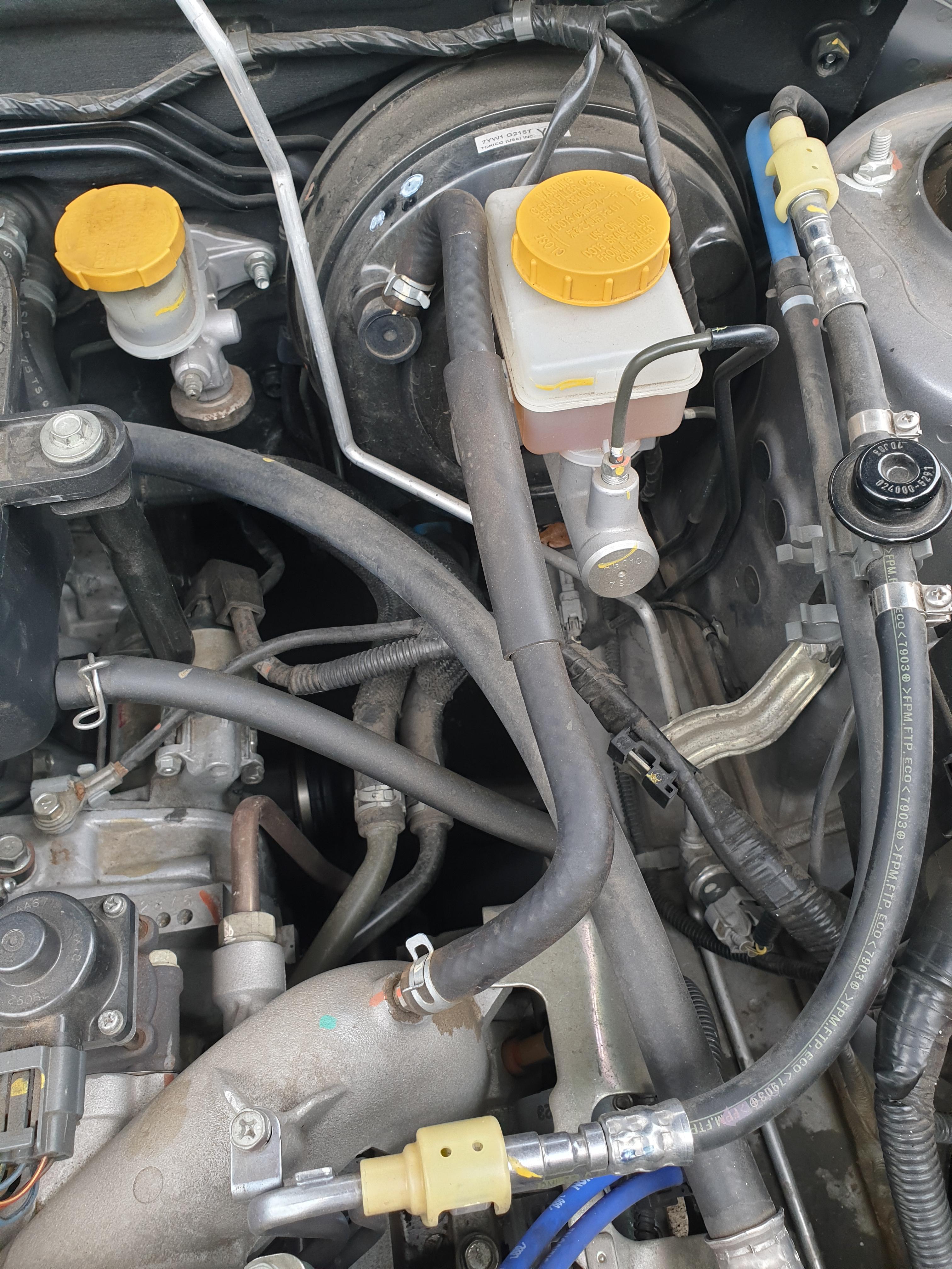 What is the tube connecting the brake booster and intake manifold also