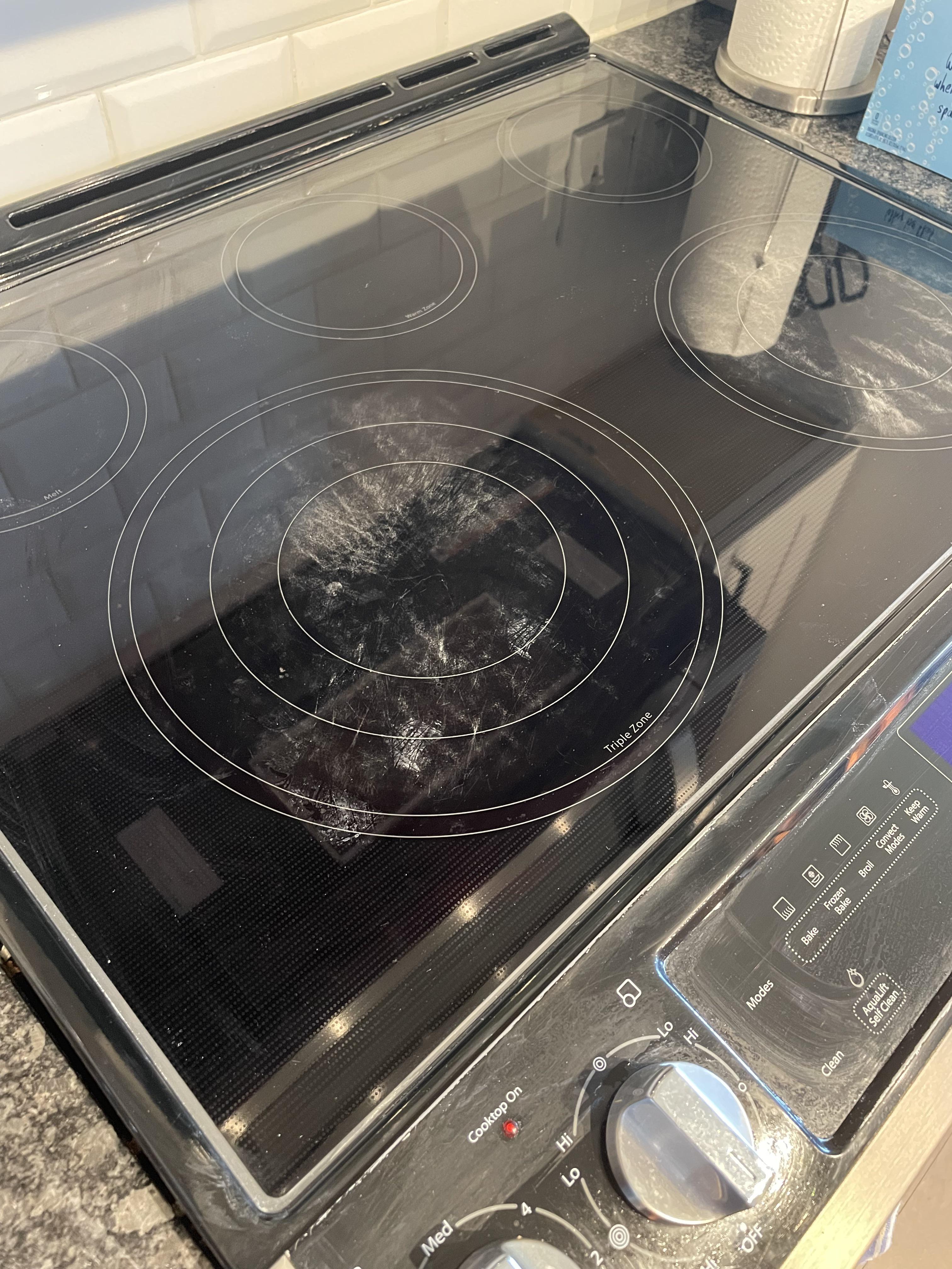 Electric stove top has scratches/stained(?) any advice on getting it fully black? r/CleaningTips