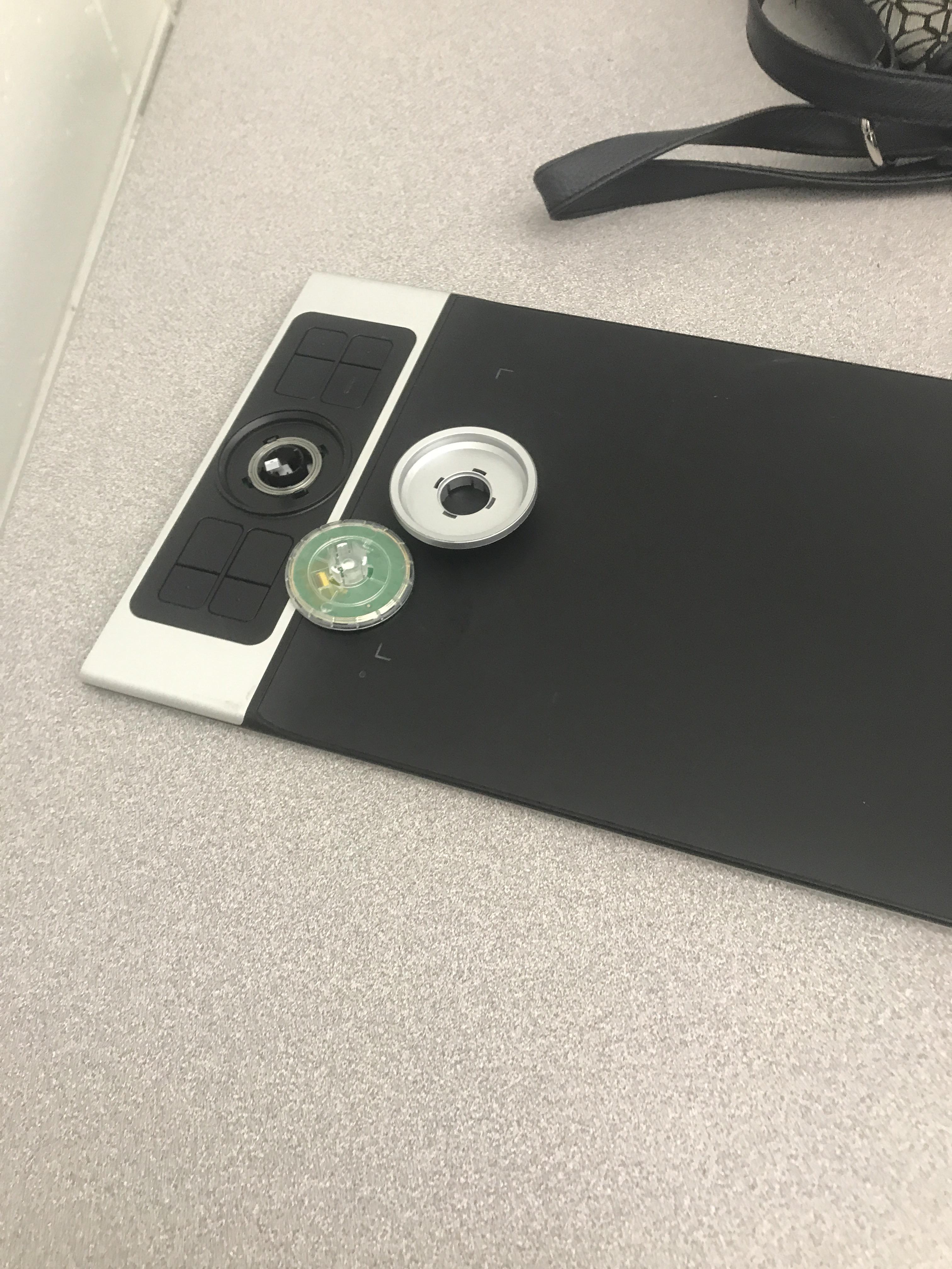 My drawing tablets spinners got pried off by a book in my backpack when I slipped on ice this