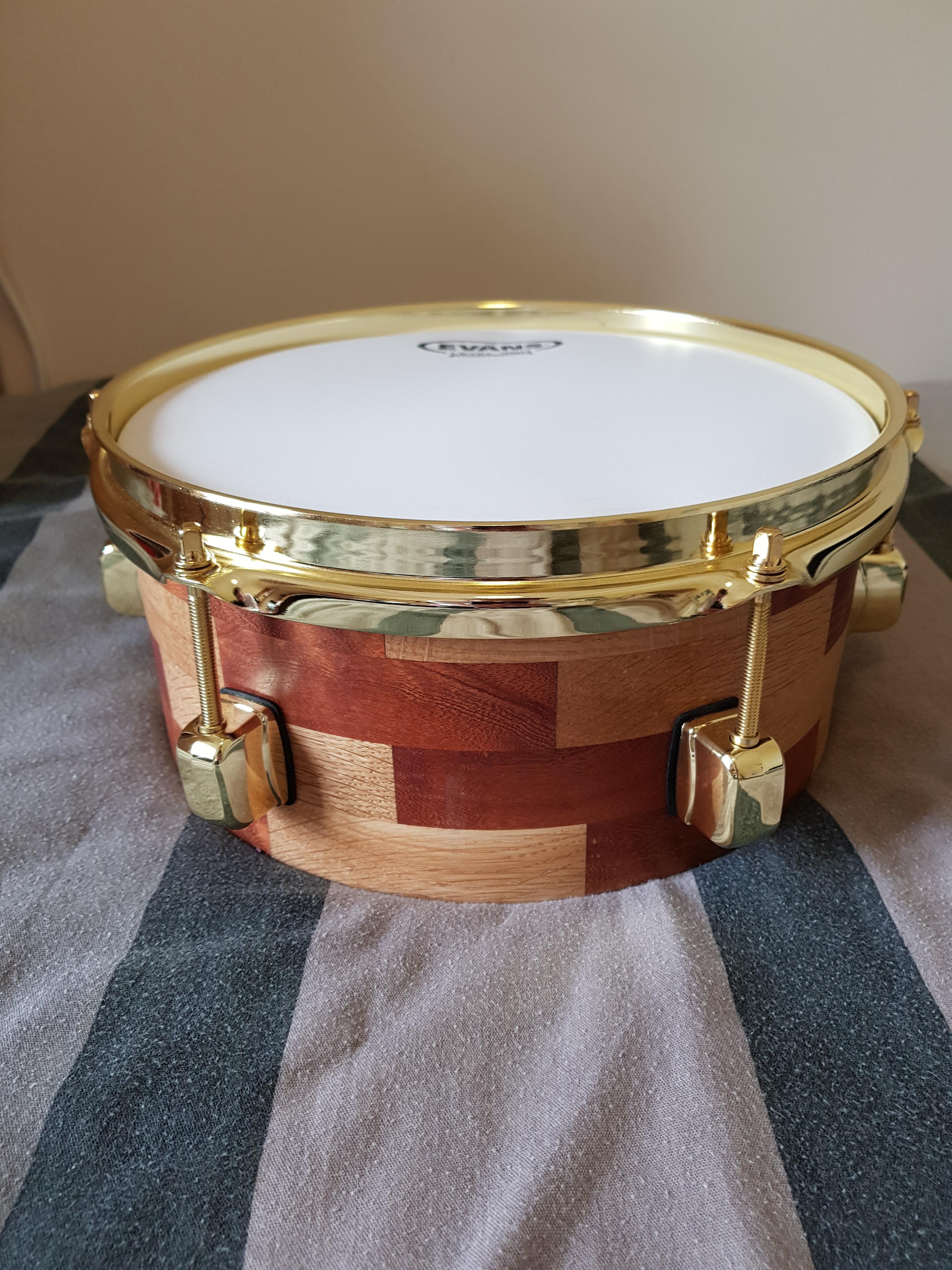 Single head drum I made. Oak and mahogany finished with Danish oil. Any