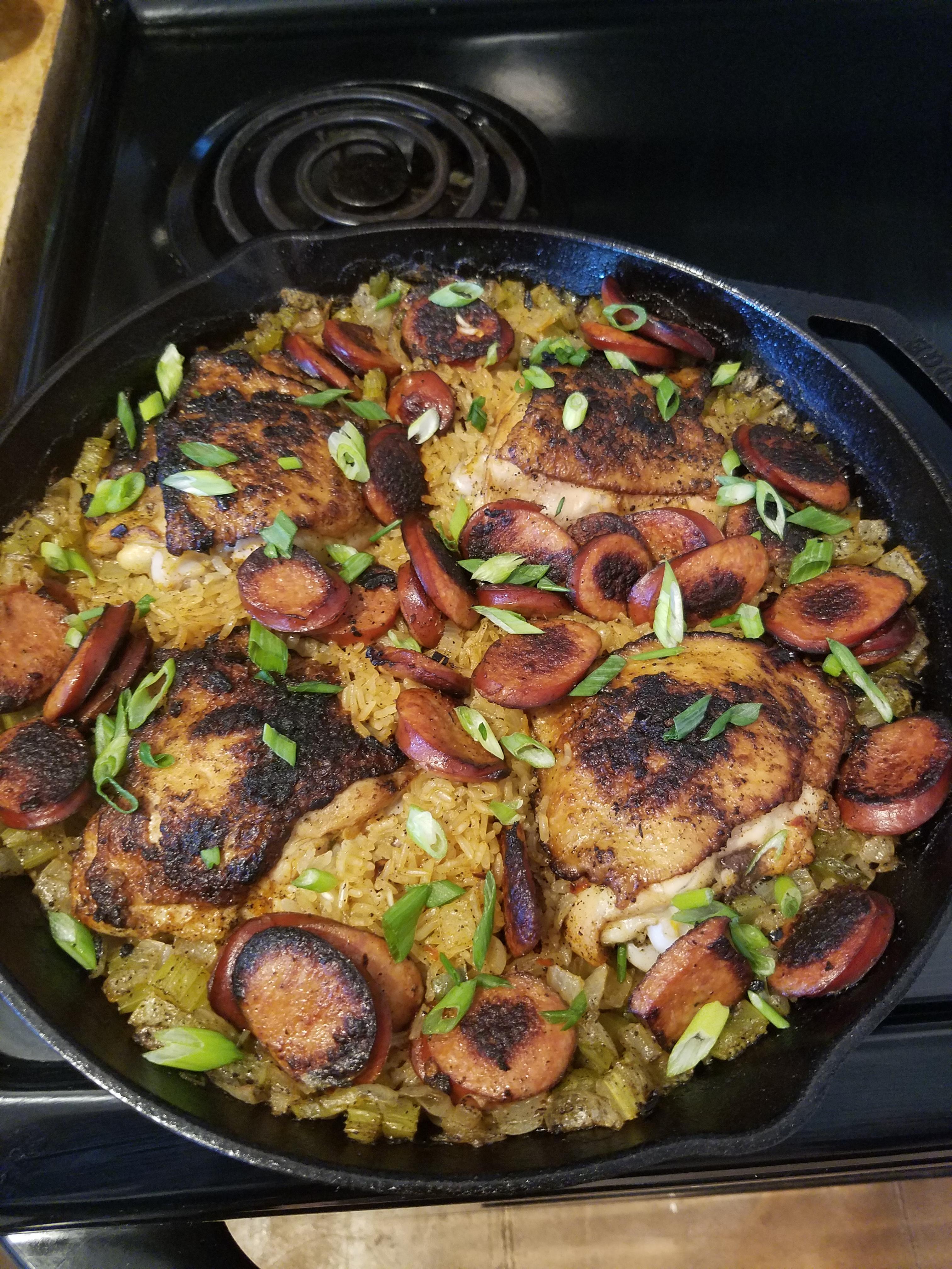 Cajun chicken with dirty rice in my 12 inch lodge. r/castiron