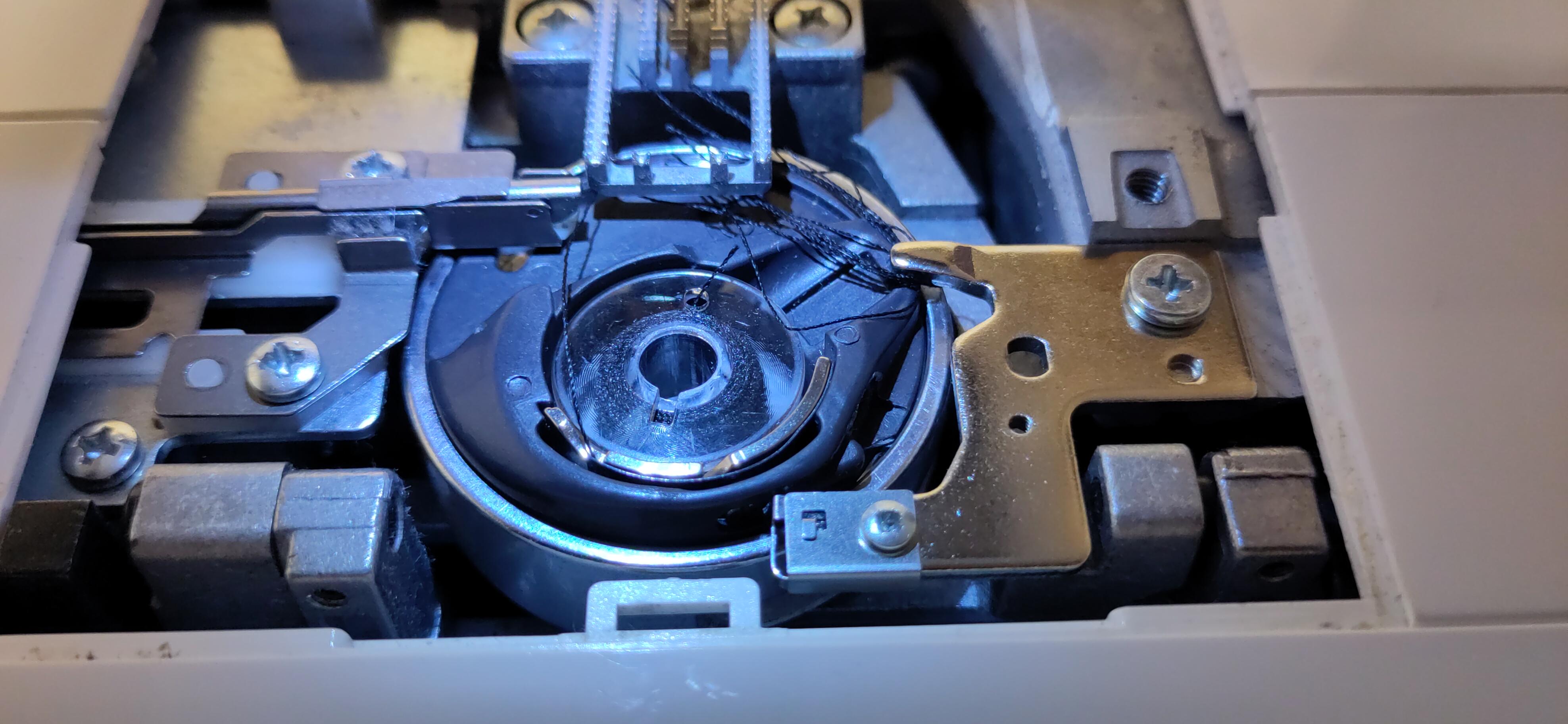 Thread getting trapped in bobbin area r/sewingmachinerepair