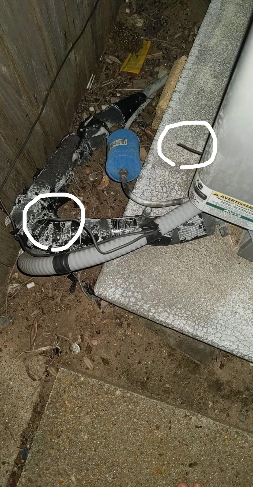 Returned home to AC not working, I am suspicious of these two exposed