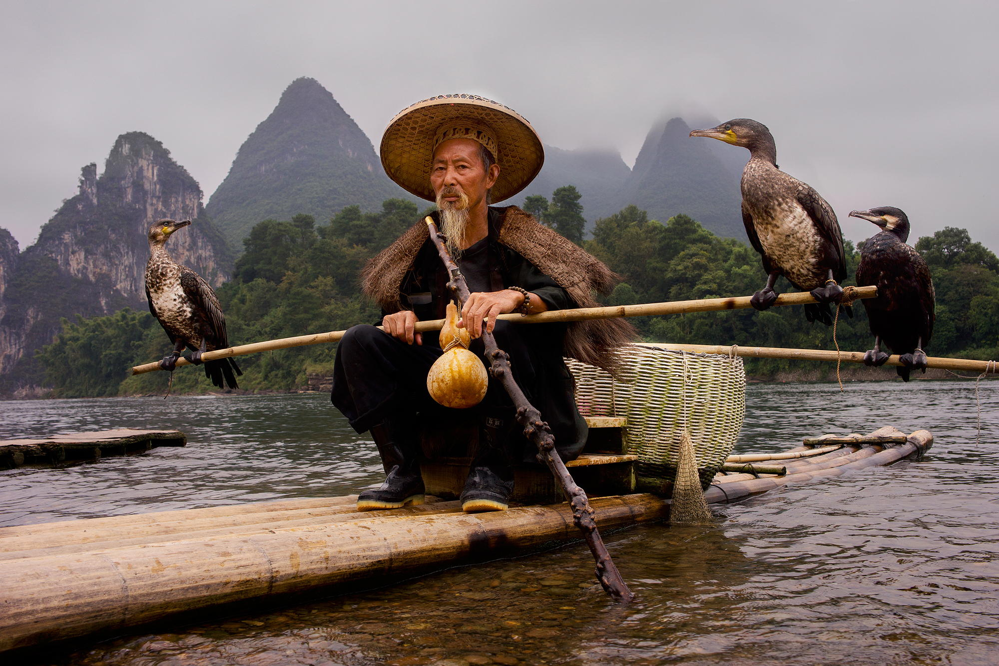 Cormorant fisherman on the Li River r/pics