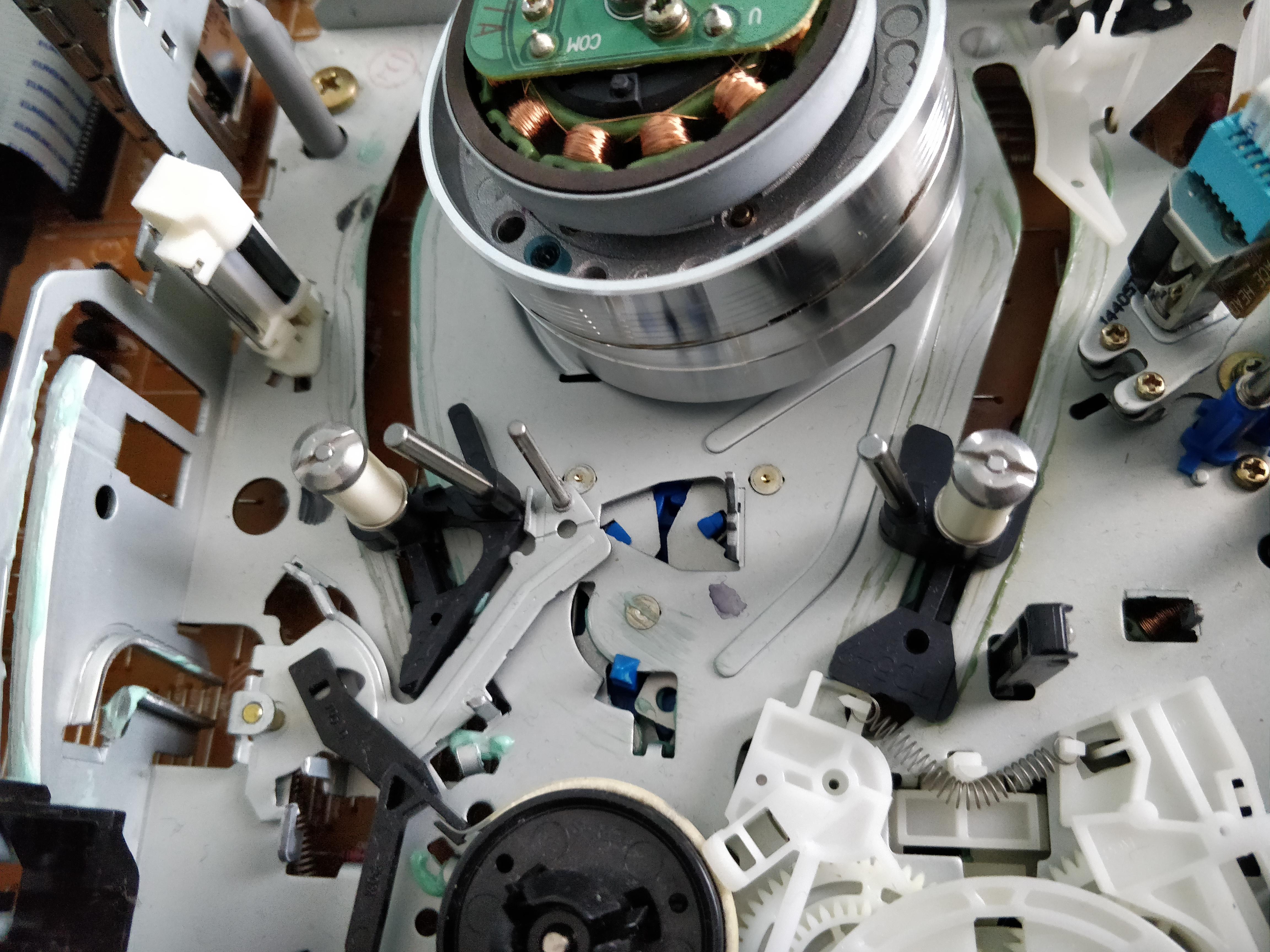 Trying to repair/clean my VHS player, what's the green stuff in there