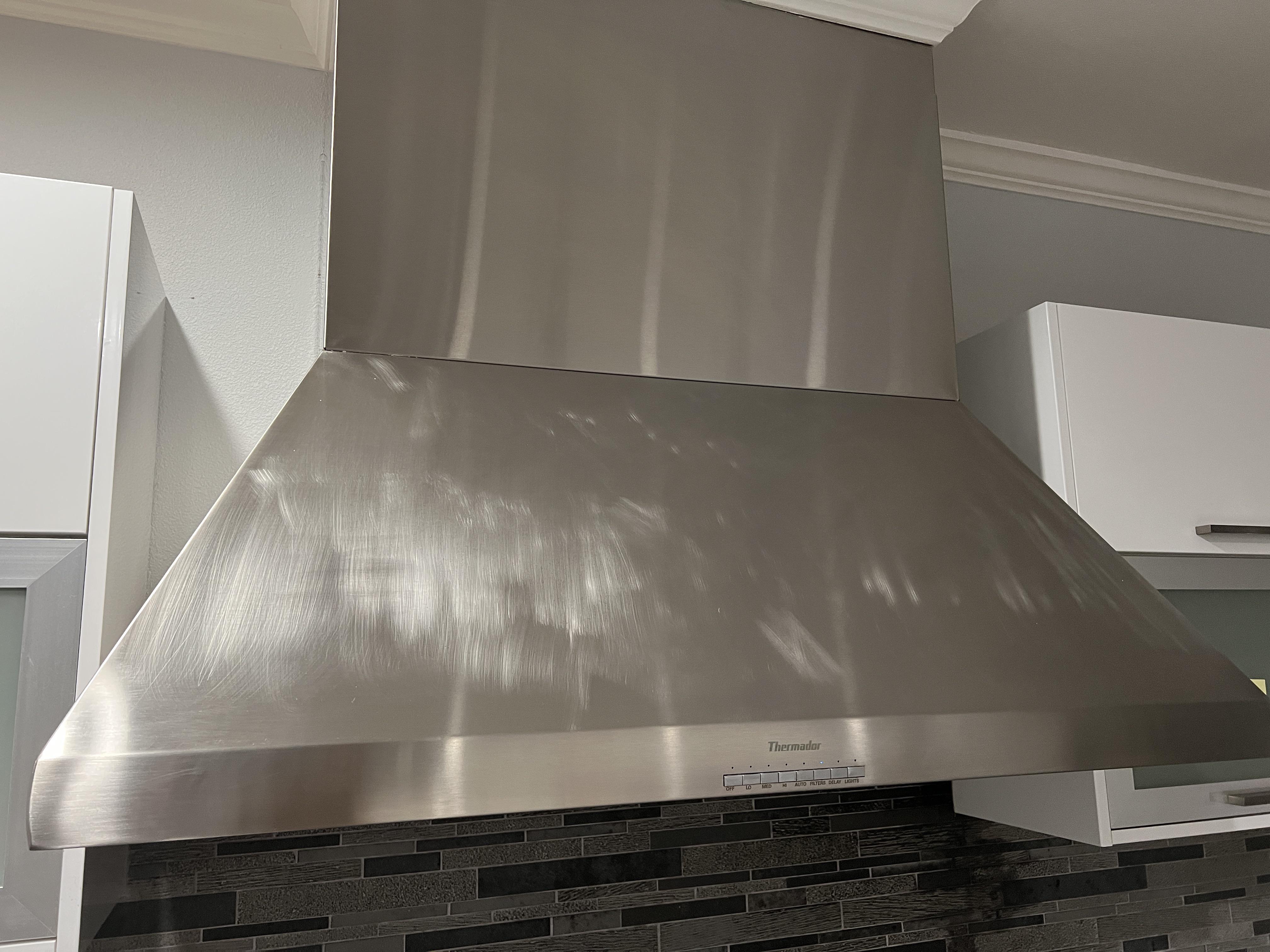 How do I clean this Stainless Steel (SS) Range Hood? Already tried