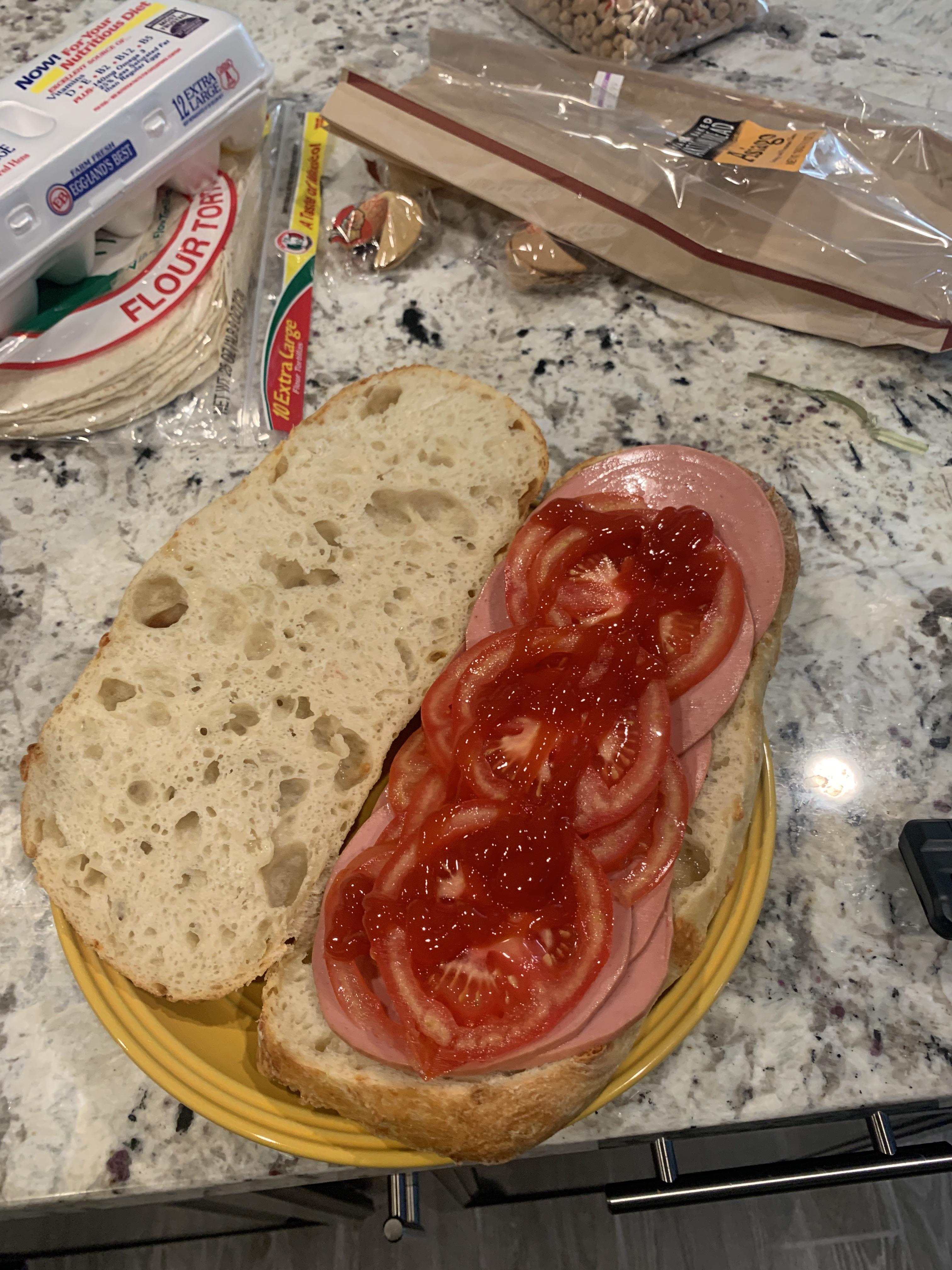 Made Michael’s favorite sandwich. Bologna, tomato, and ketchup. It was