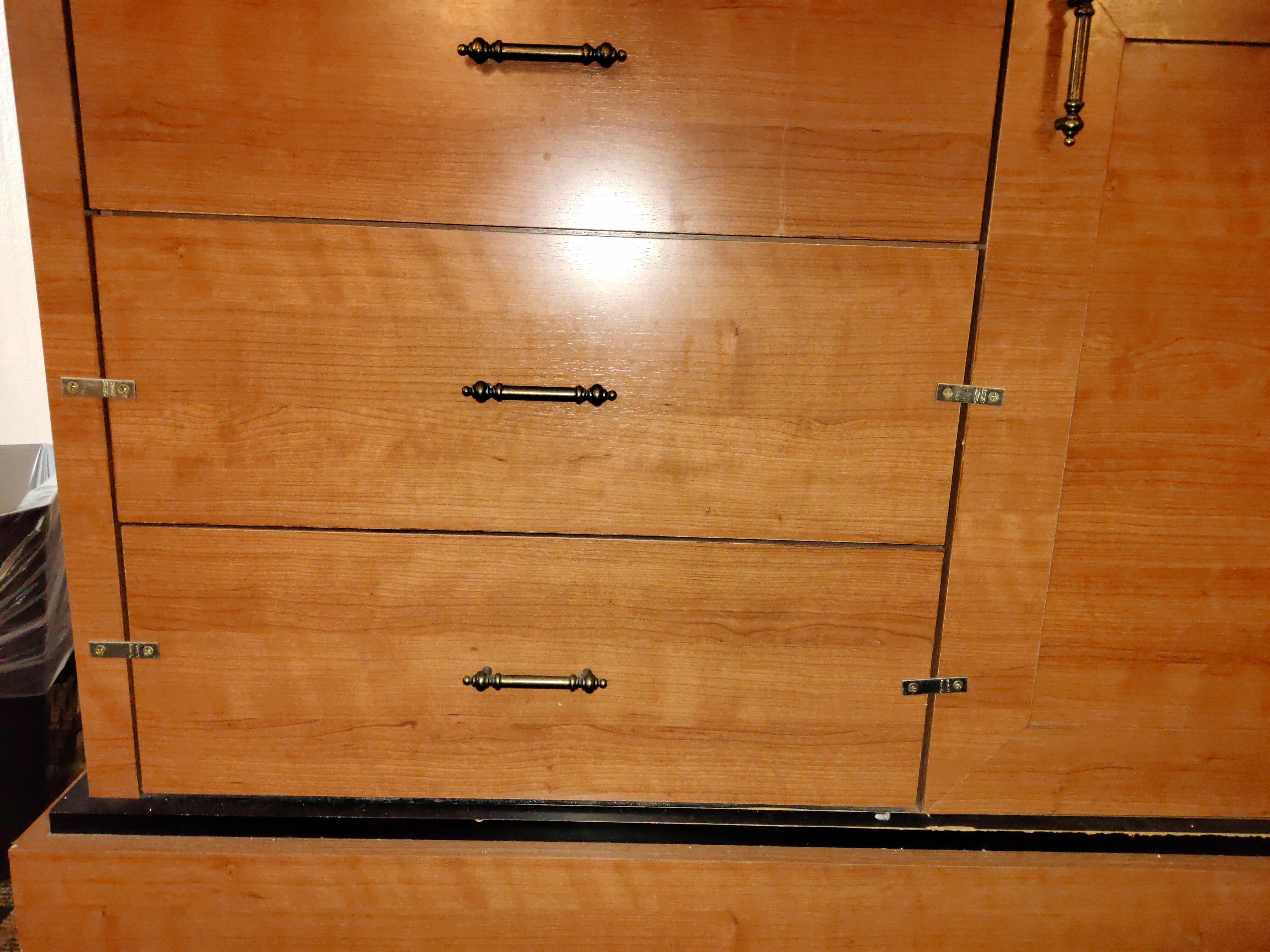 The drawers of my hotel room dresser are screwed shut... r/assholedesign