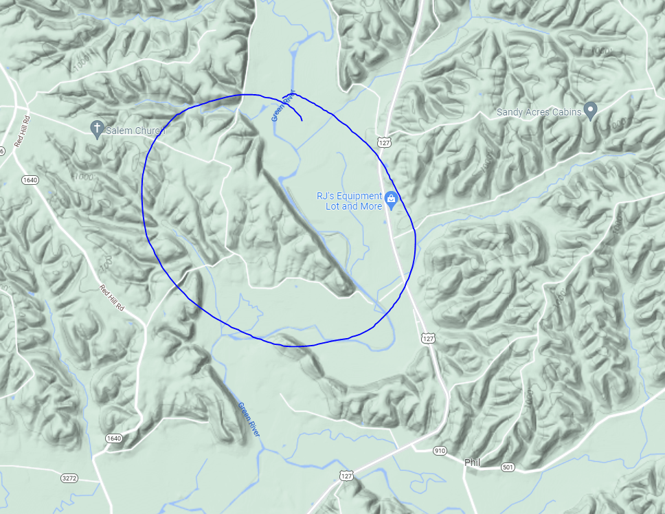 Geomorphology question What causes this straight cliff, while the rest