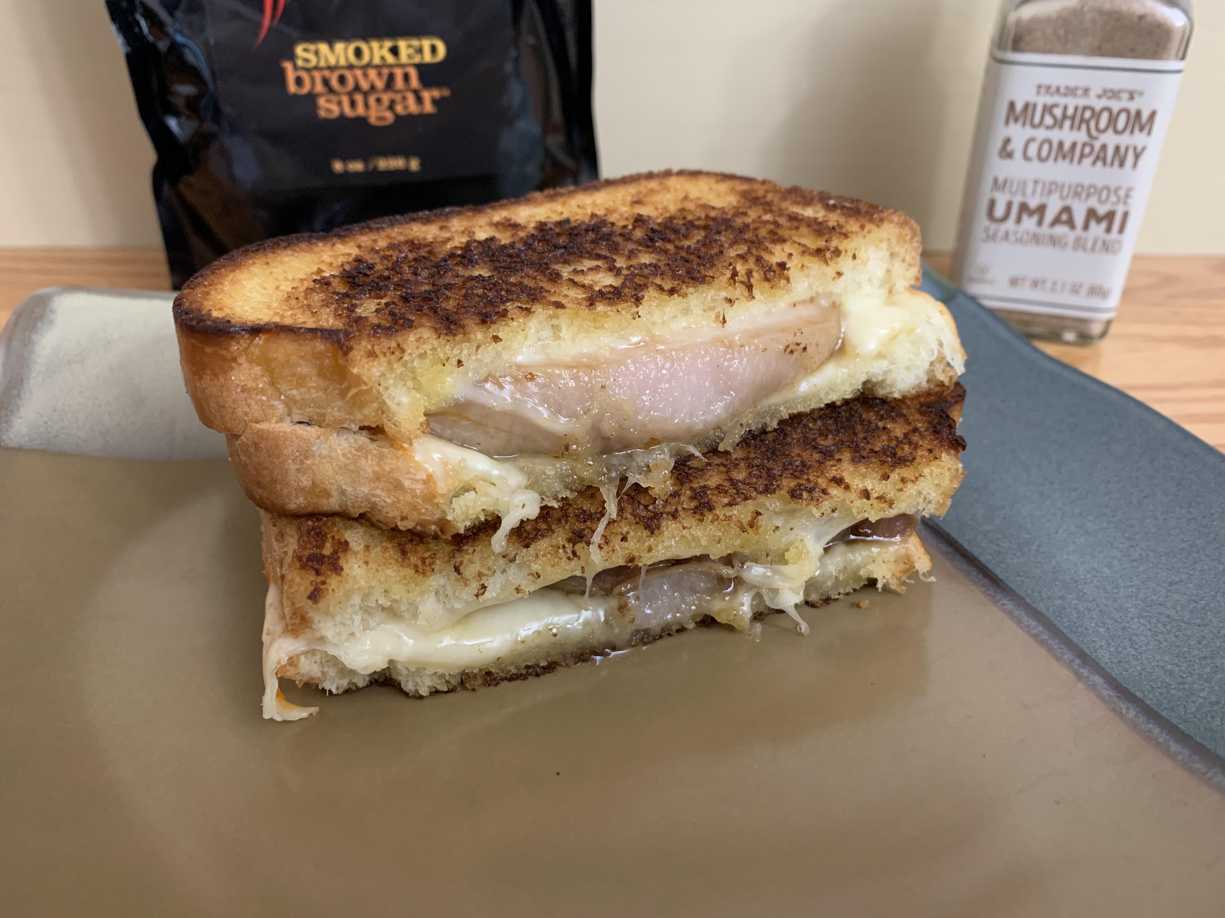 Muenster cheese and smoked brown sugar caramelized pork belly melt on