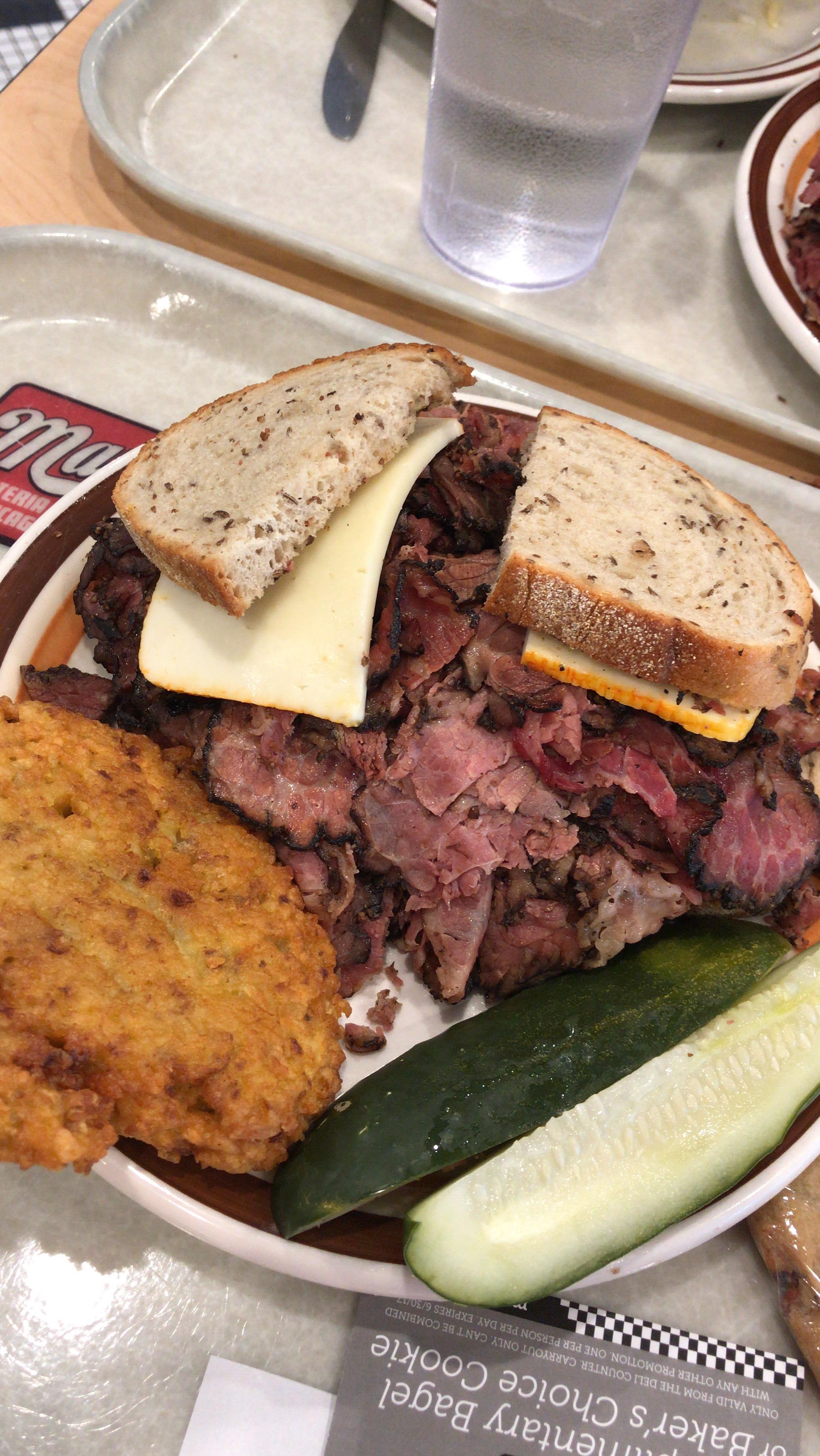 [I ate] Pastrami on Rye with a potato pancake and two pickle spears r