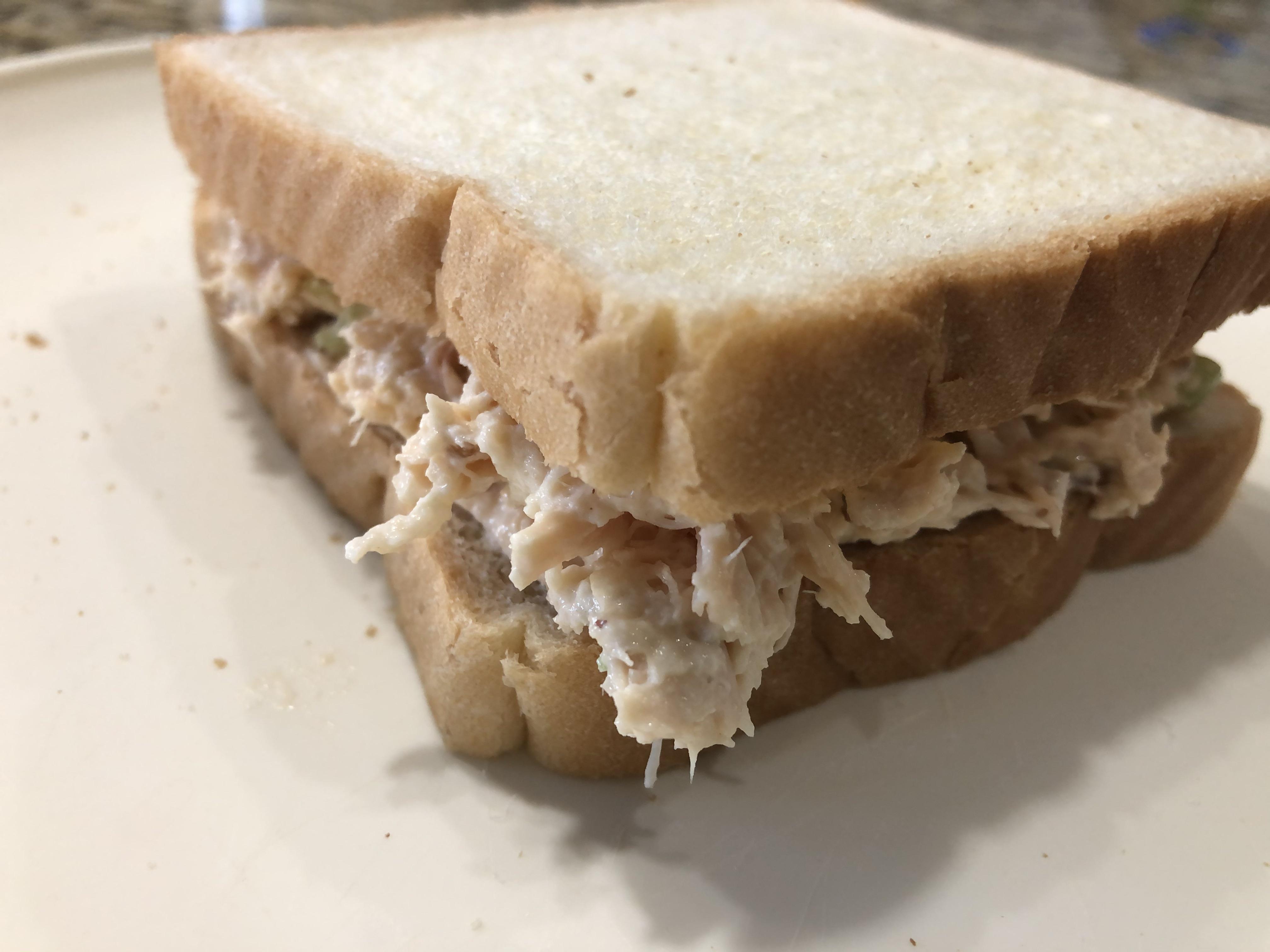 Chicken salad with just a touch of wasabi and chili paste on white