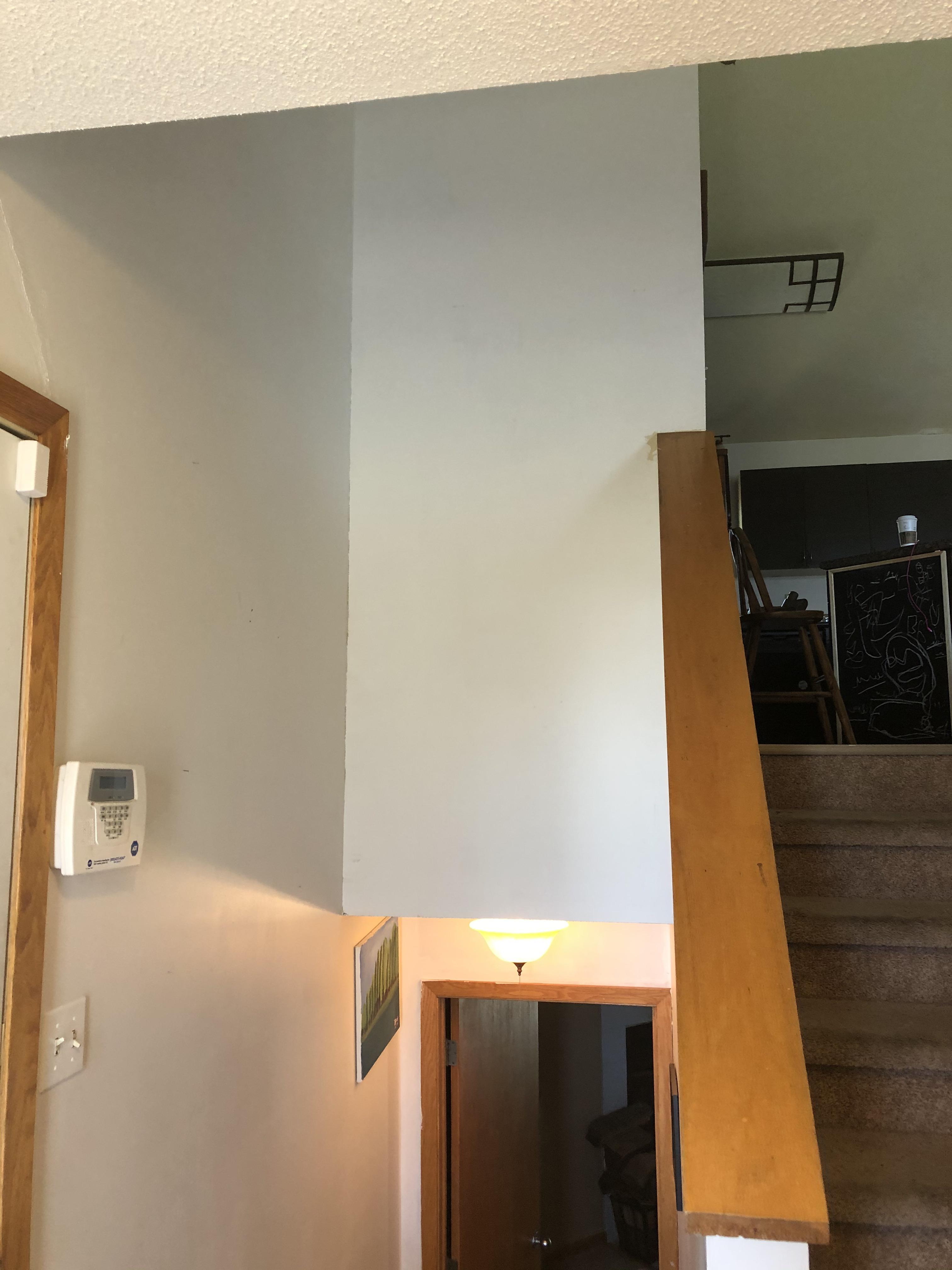Split level entry way how would you decorate these walls? r