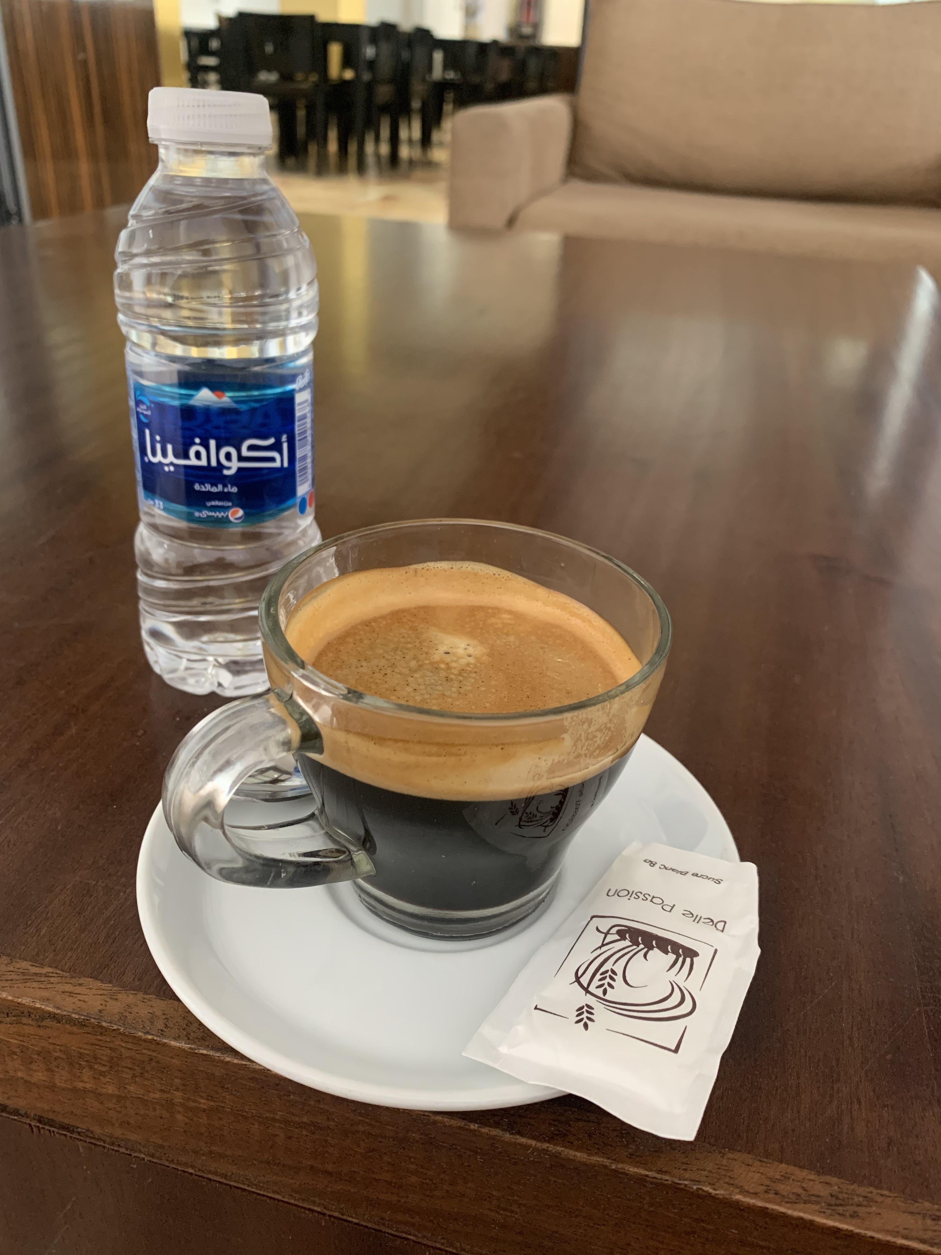 The coffee in Morocco always comes with a water bottle. ) r