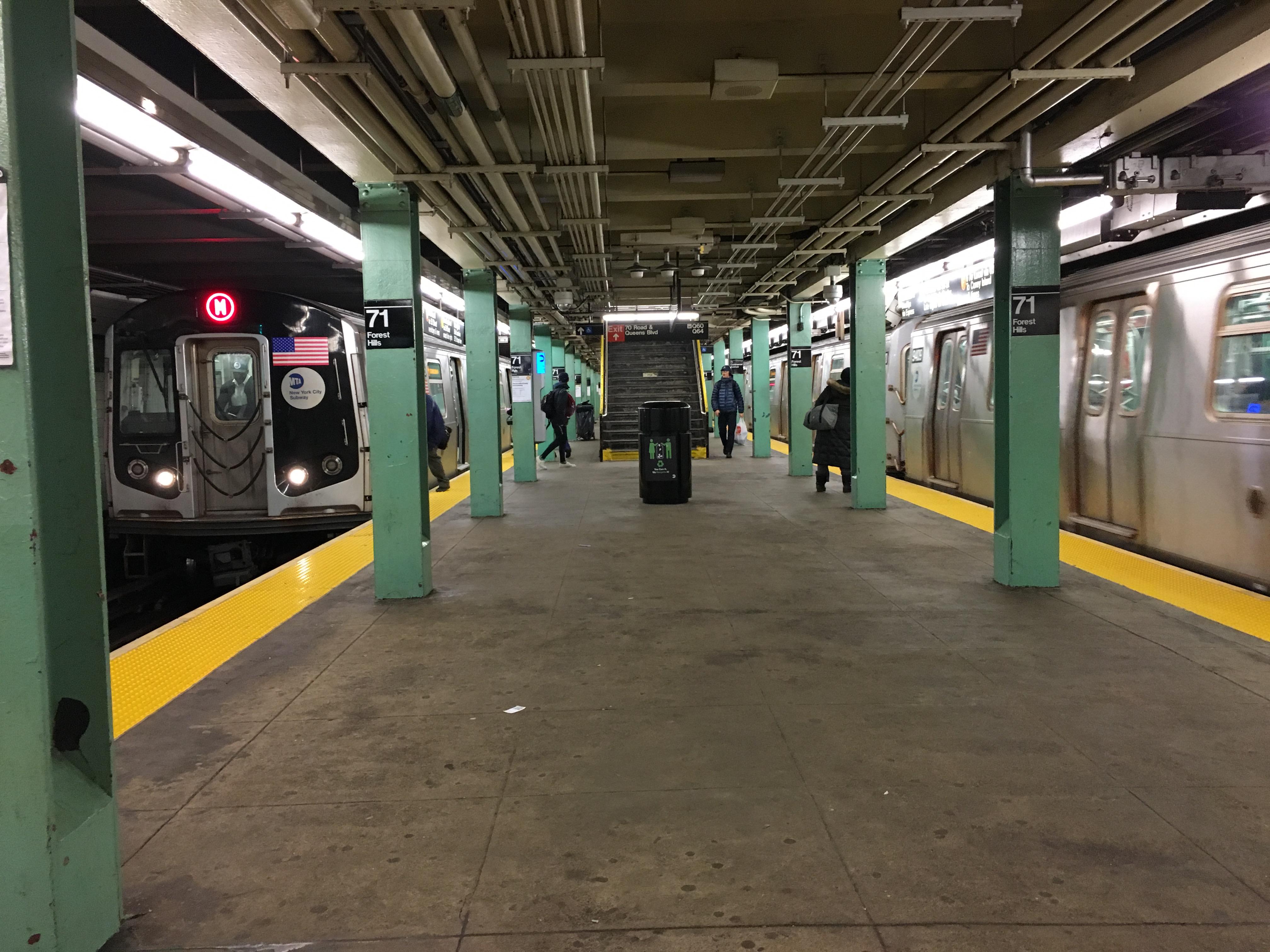 E and M trains at Forest Hills71 Av r/trains
