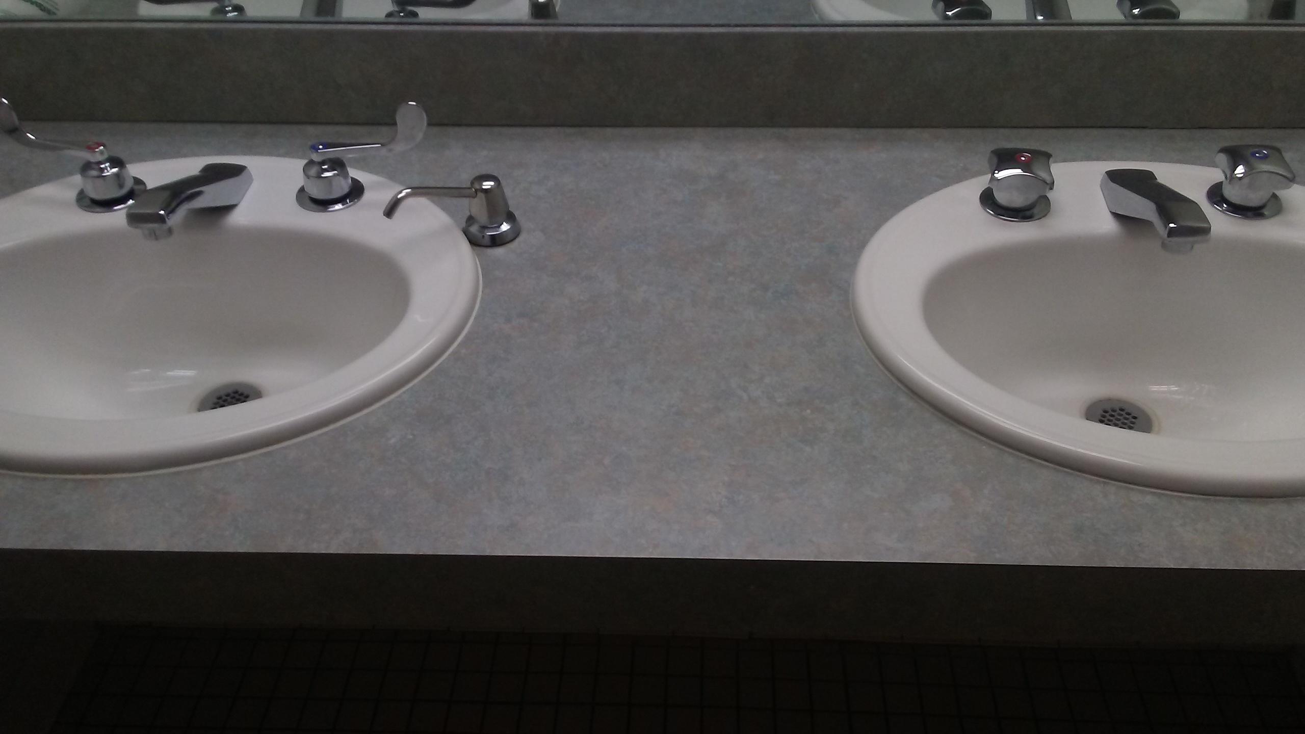 This bathroom has two different sink handles. r/mildlyinfuriating