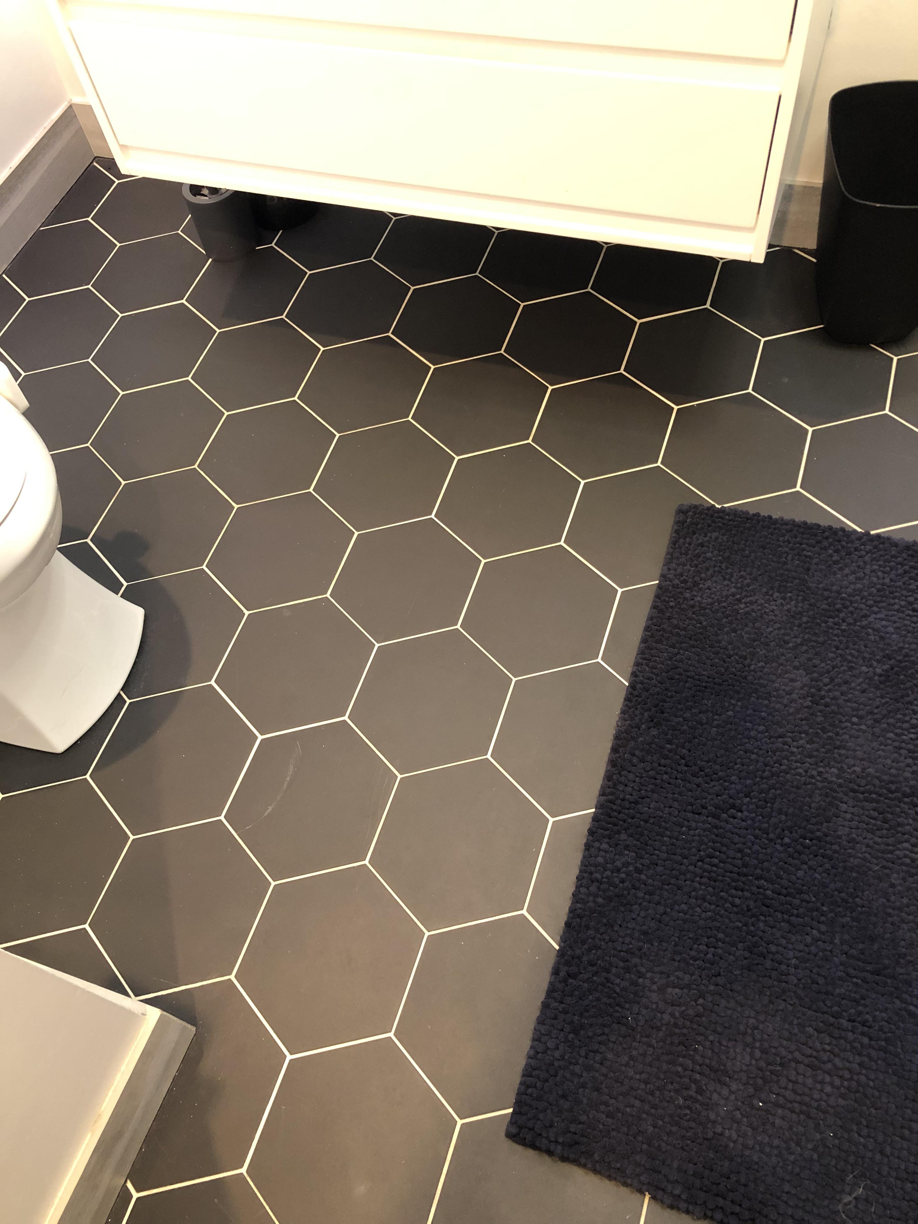 Low Grout Joints & Cracked Laminate Tiles Flooring