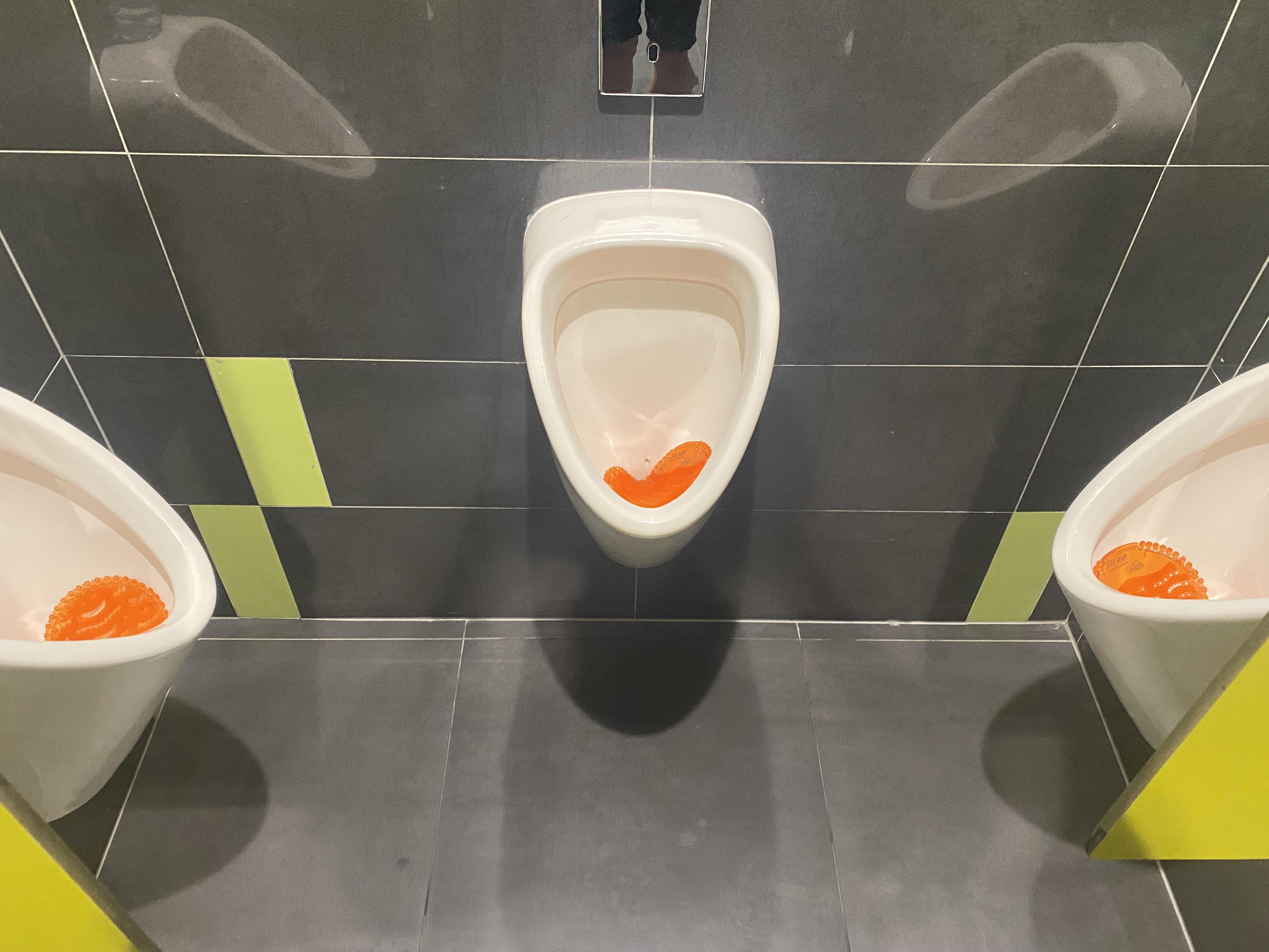 Urinals at an international airport UrinalDesign