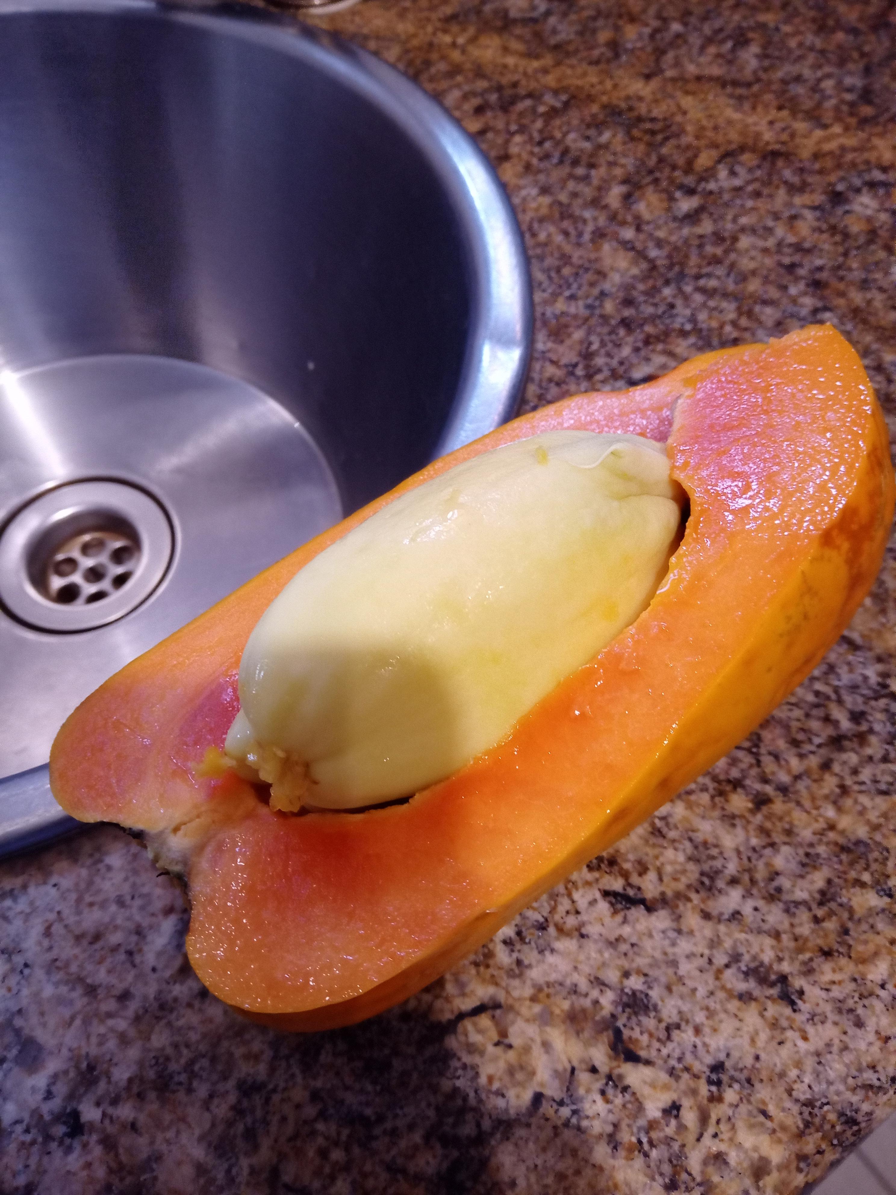 A baby Papaya inside a big Papaya (no seeds found) r/mildlyinteresting