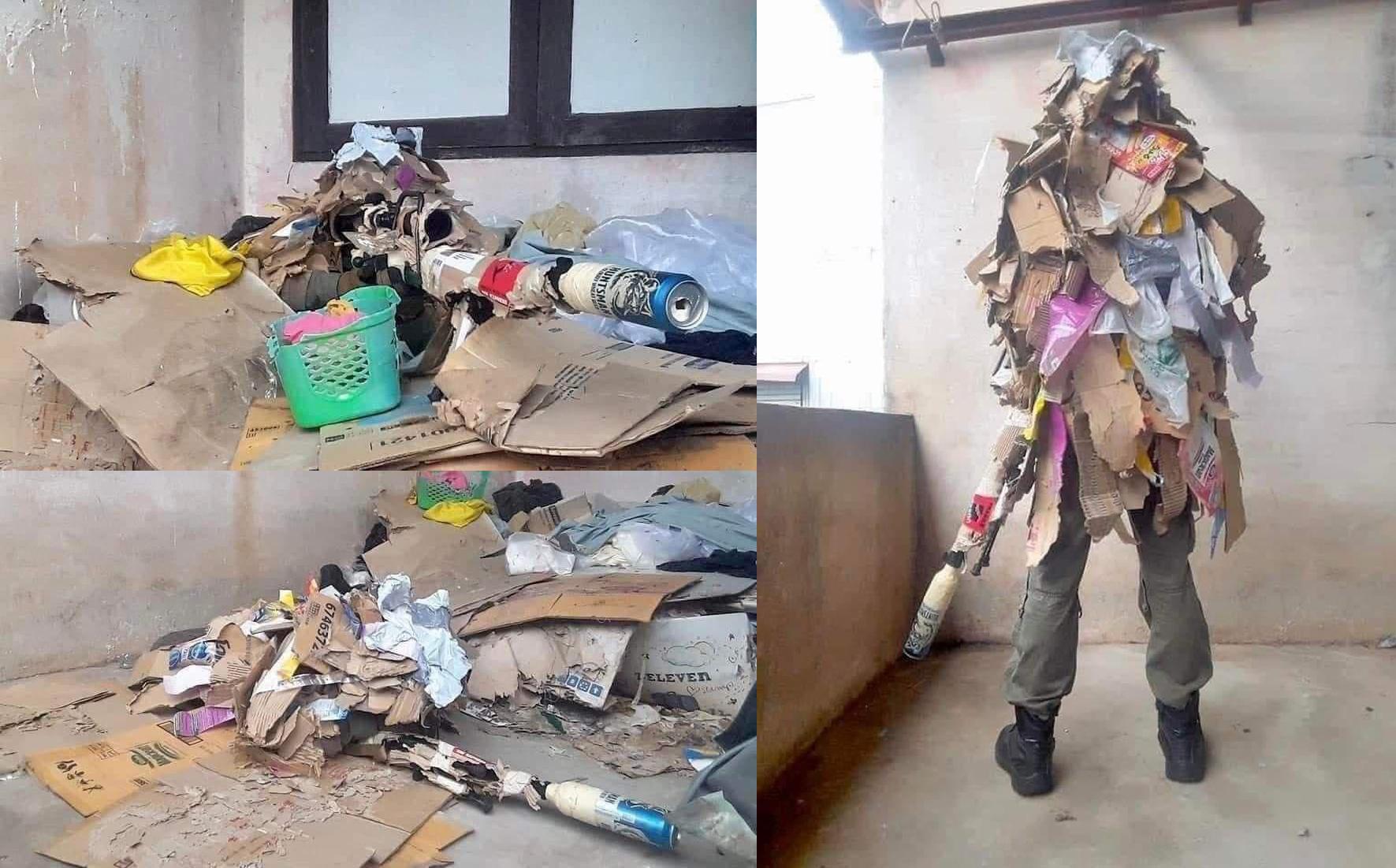 A soldier tries out a new ghillie suit for combat in the ruins. r