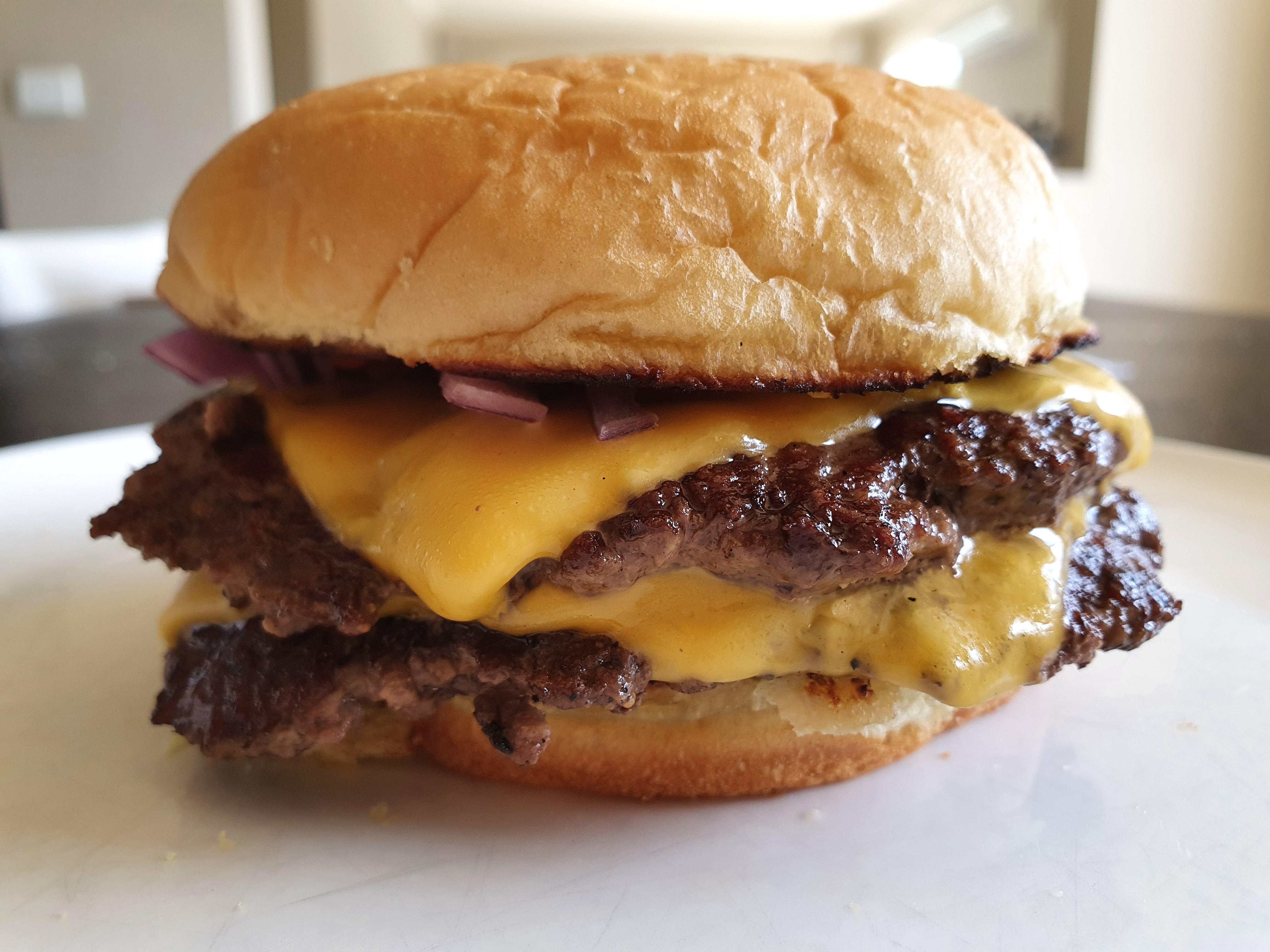 [Homemade] Double cheese burger on a potato bun r/food