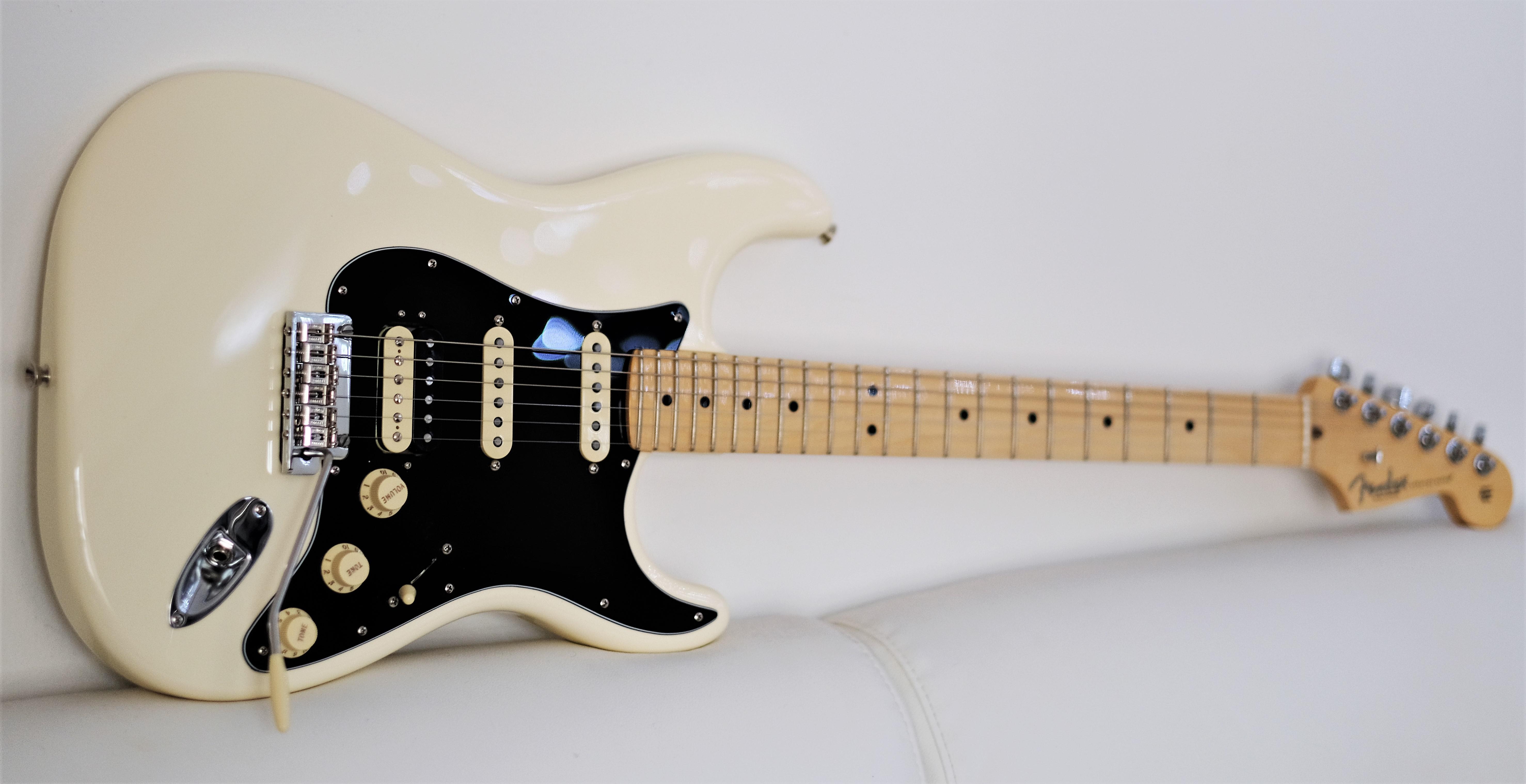 American Olympic White Pro Strat. Changed to black pickguard. r