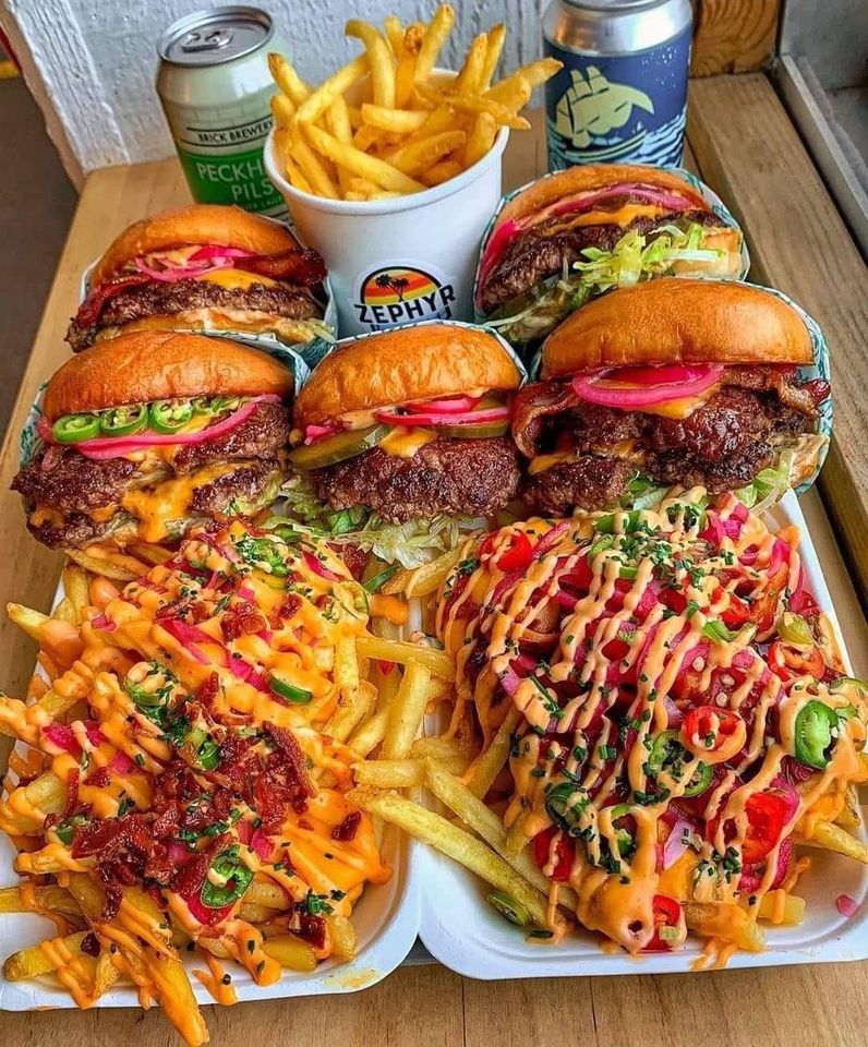 Delicious Chicken Burgers and Chips With Some Drinks. FoodZila