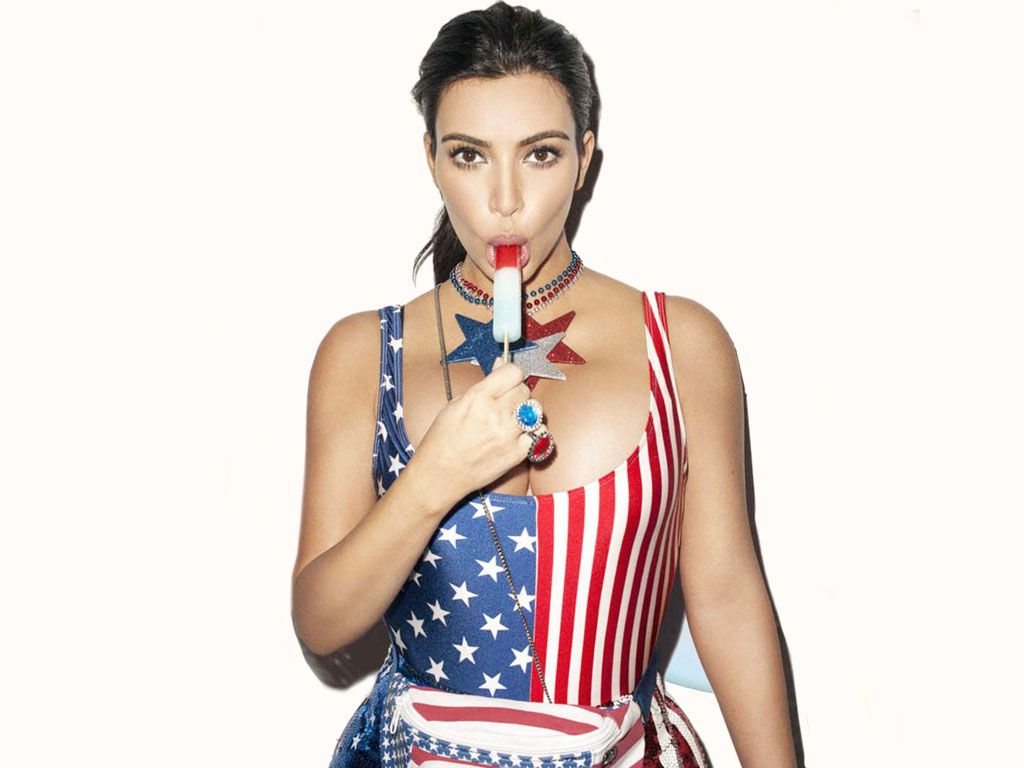 Kim K teasing huge boobs and cleavage - Celeblr