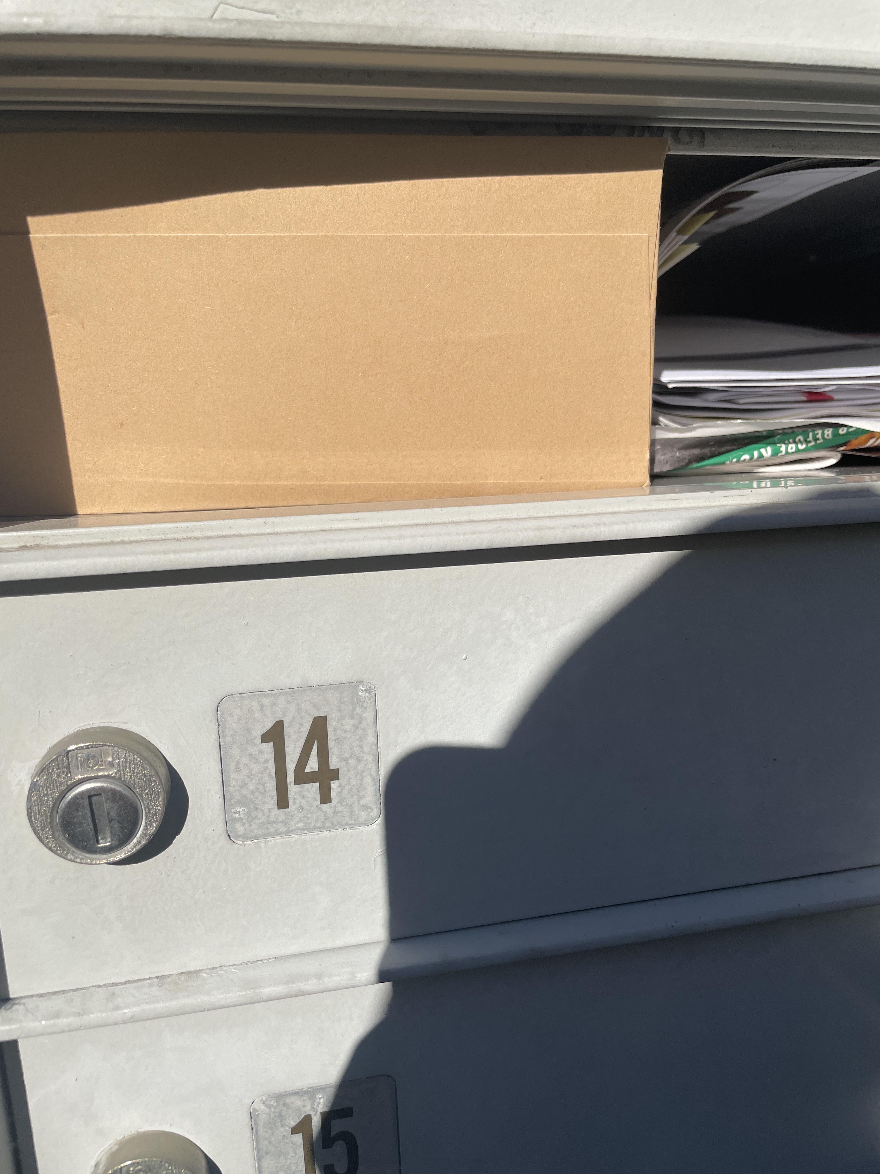 The way this box is jammed into my mailbox. r/mildlyinfuriating