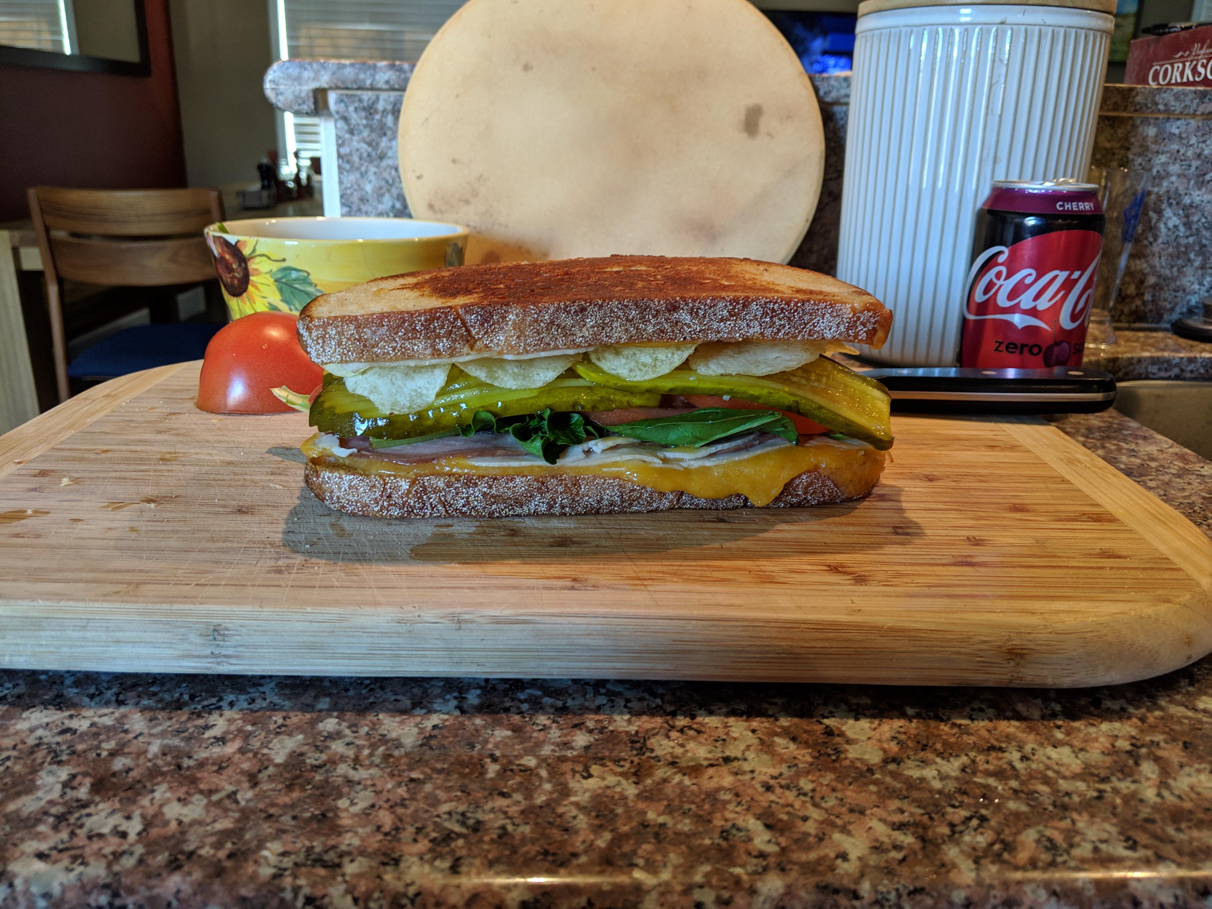 Ham, Turkey, and Cheddar Melt on Sourdough with Potato Chips It was glorious r/eatsandwiches