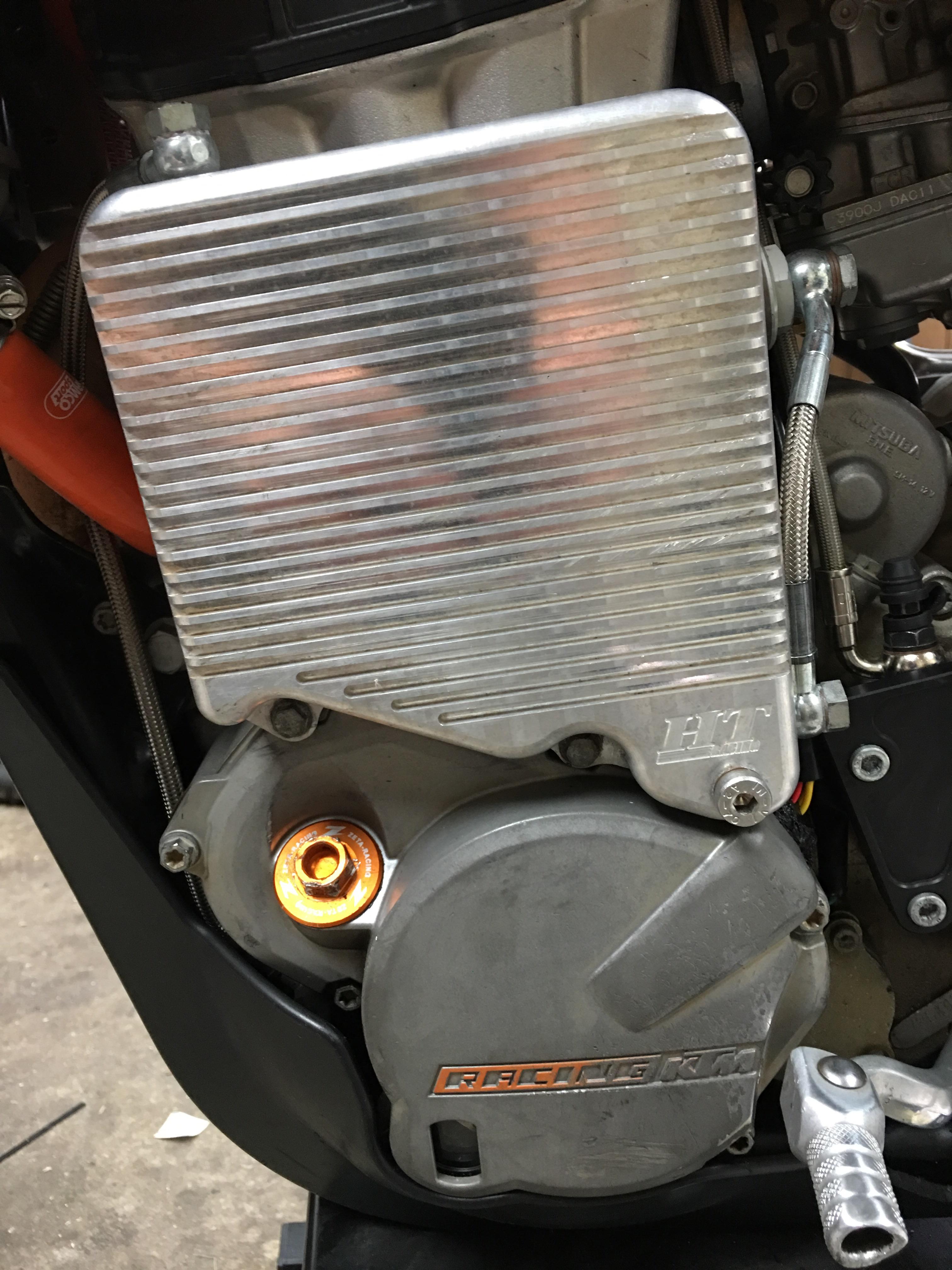 2010 530exc with HT oil cooler. How much oil do you add to engine side