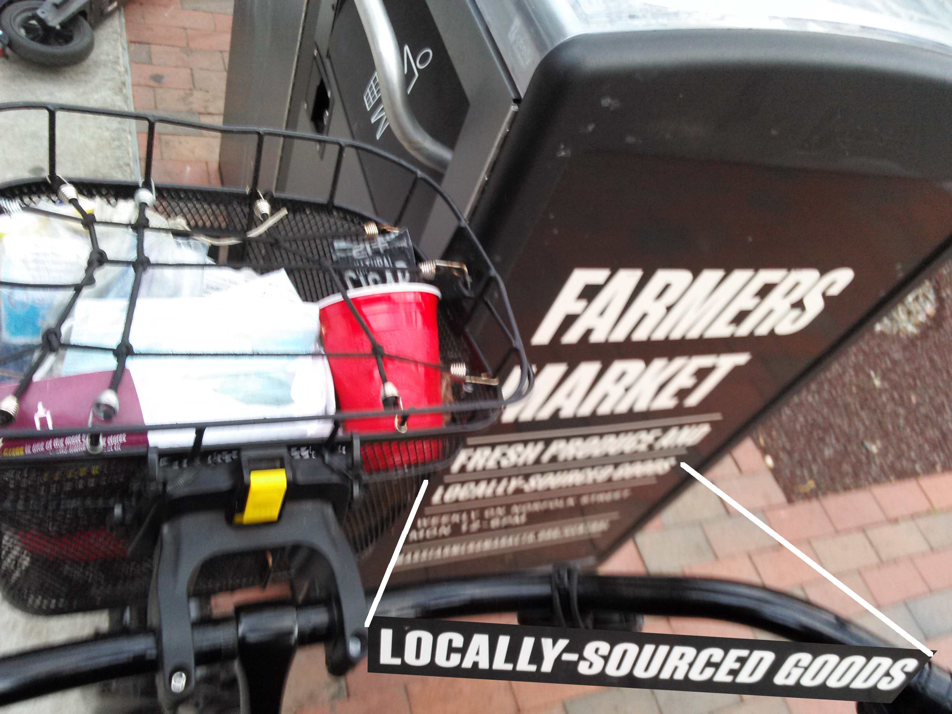A Cambridge bin for Cambridge trash. just another bicycle basket of