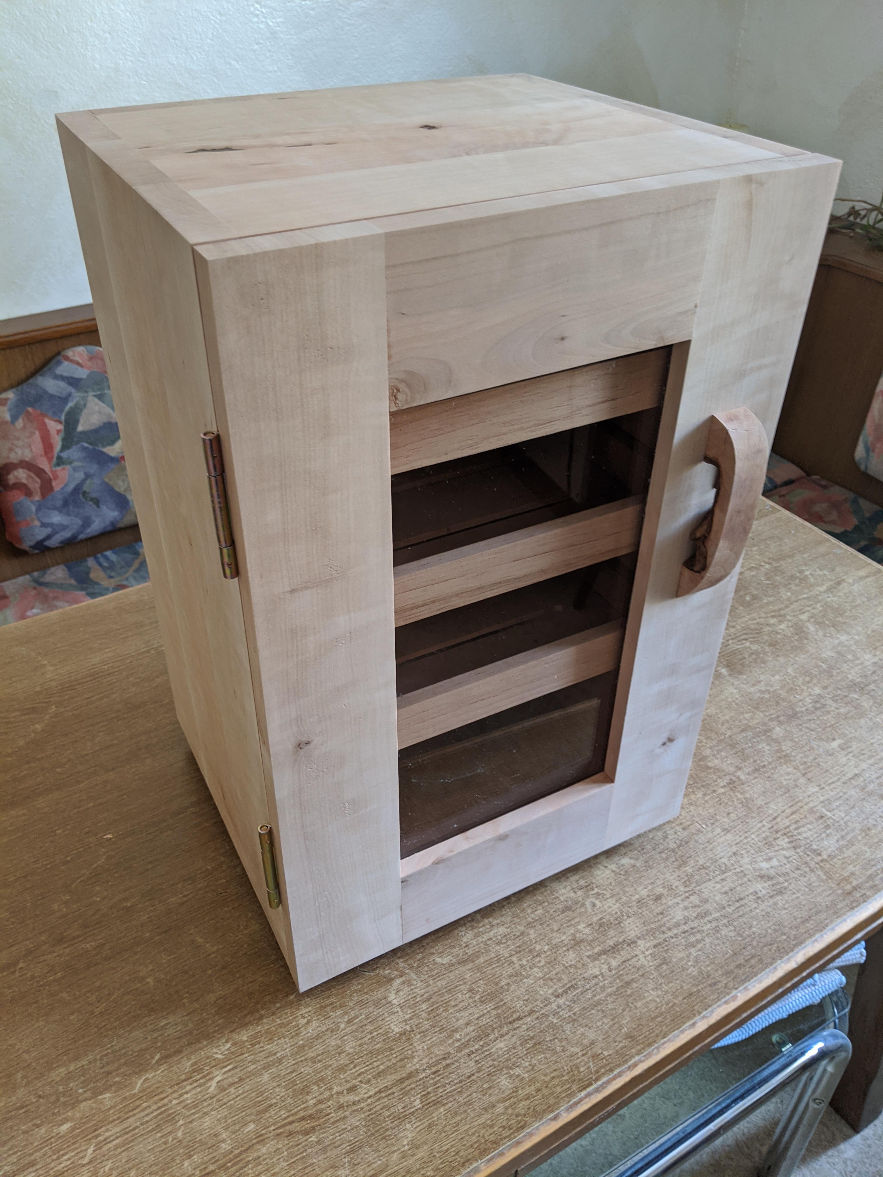 Built my own wooden humidor. I used pear Wood and spanish cedar in the inside. r/cigars
