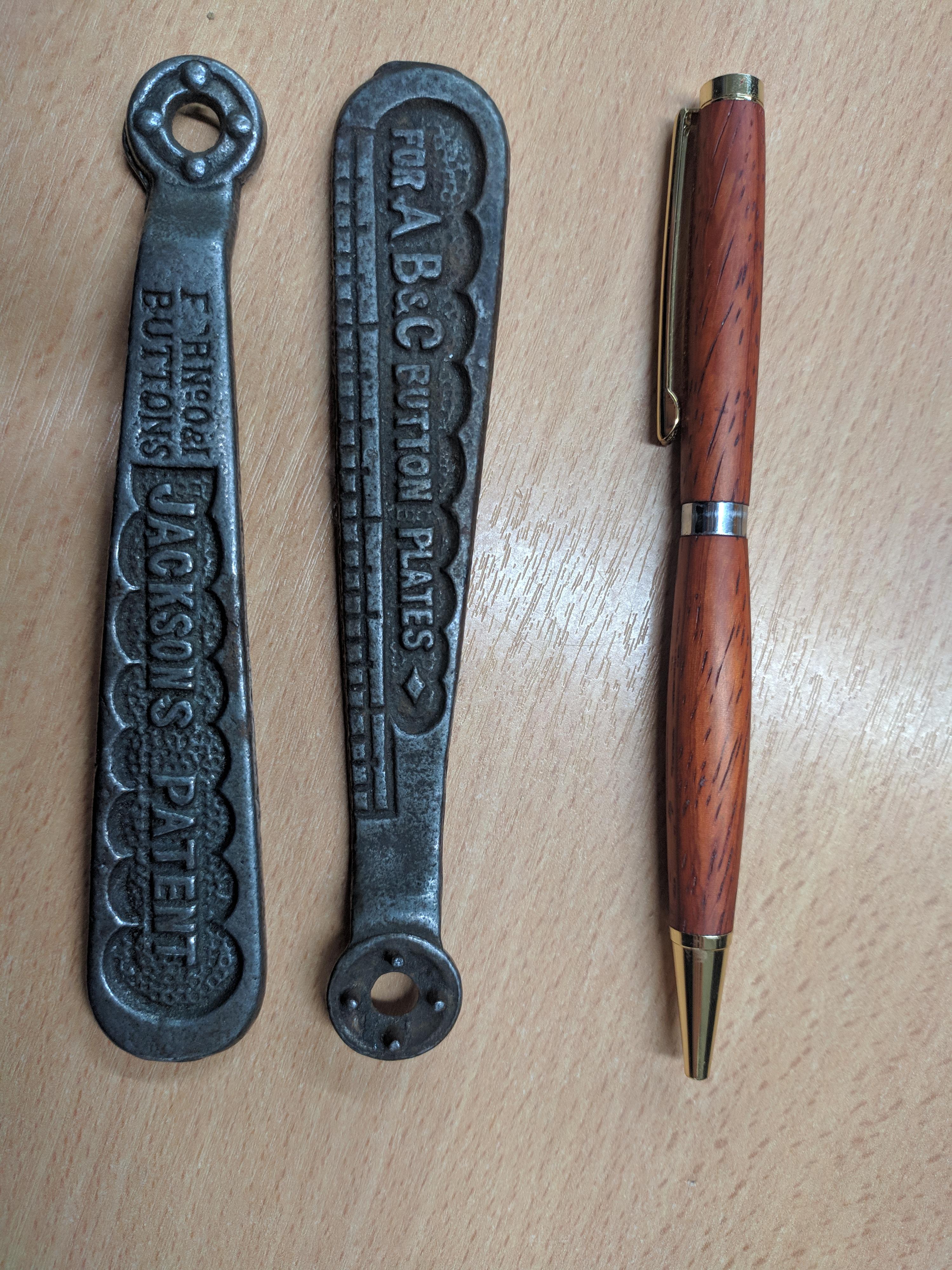 Small metal handles (pen for size) found in a box of tools in England