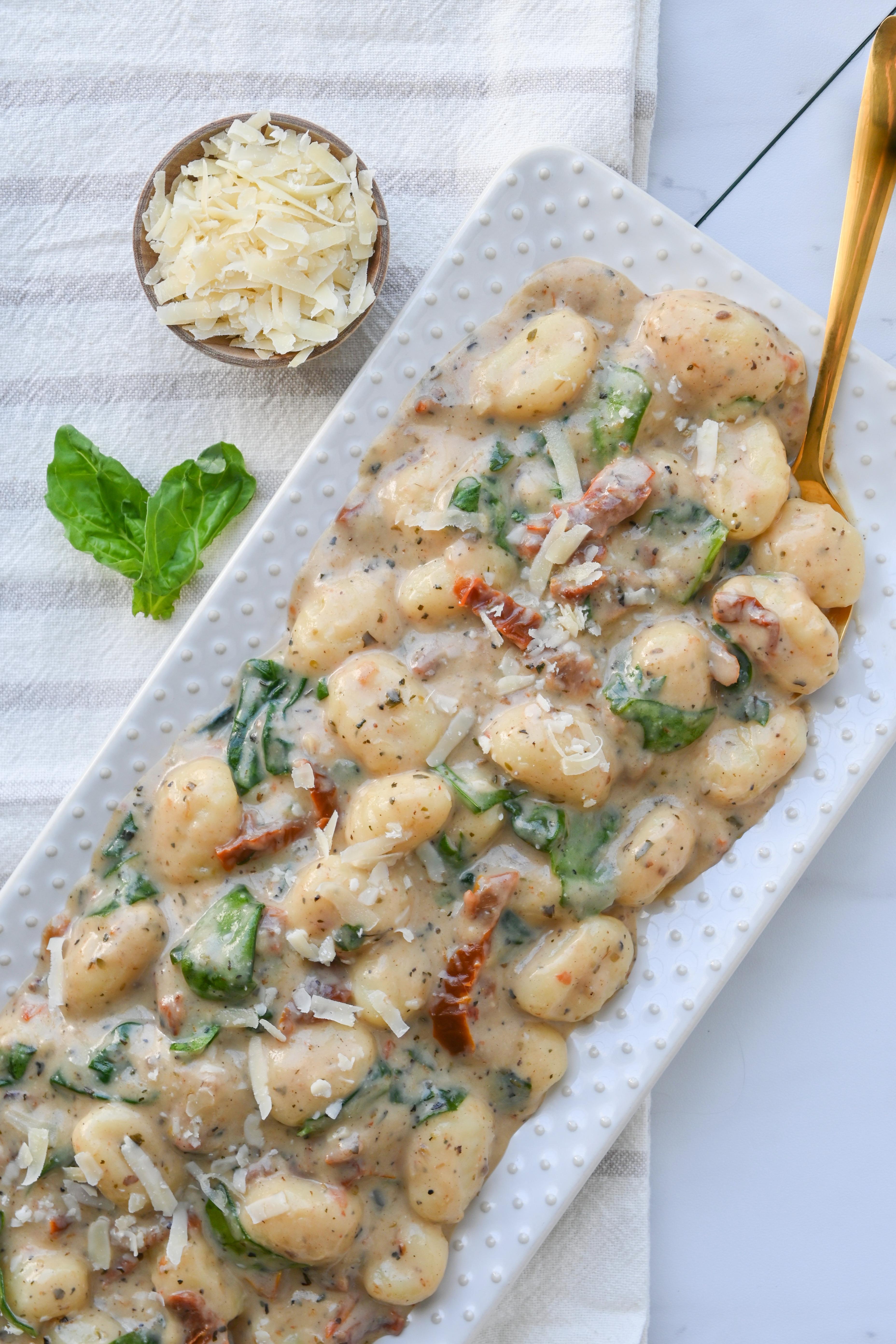 Gnocchi with sundried tomatoes, spinach, basil, garlic, and cream with