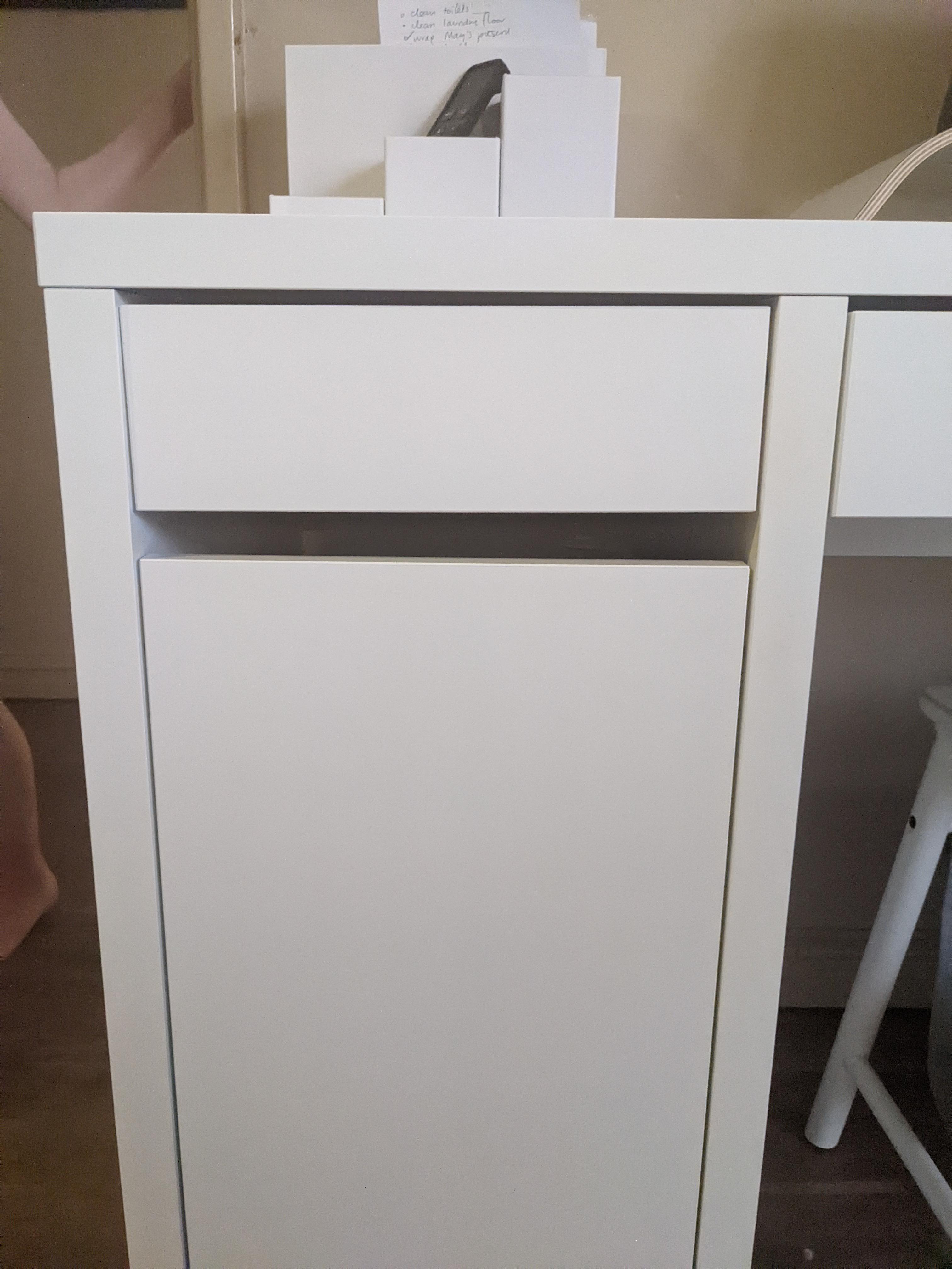 Drawer face crooked on Micke desk. The other drawer is doing it too
